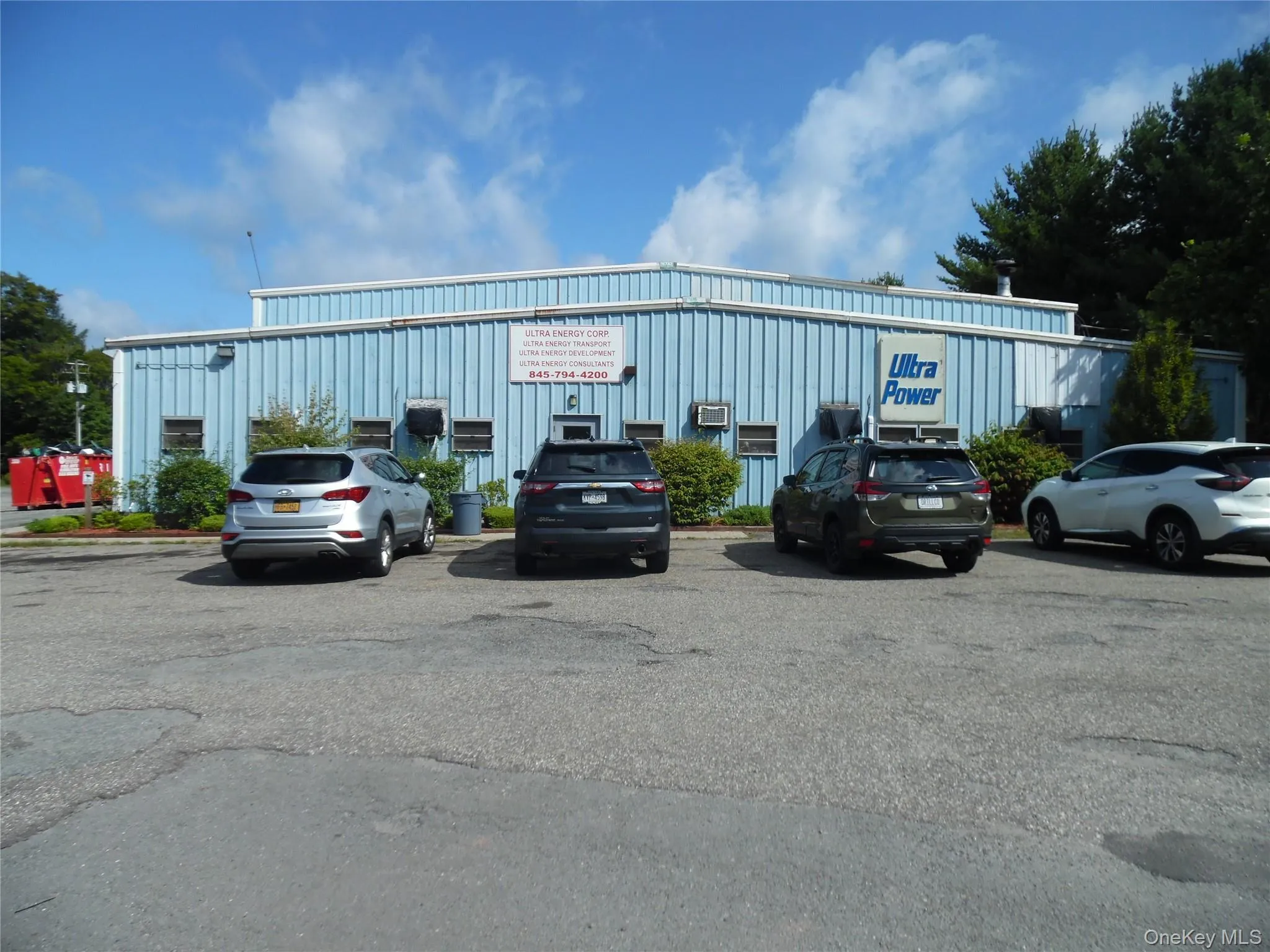 View of uncovered parking lot View of uncovered parking lot
