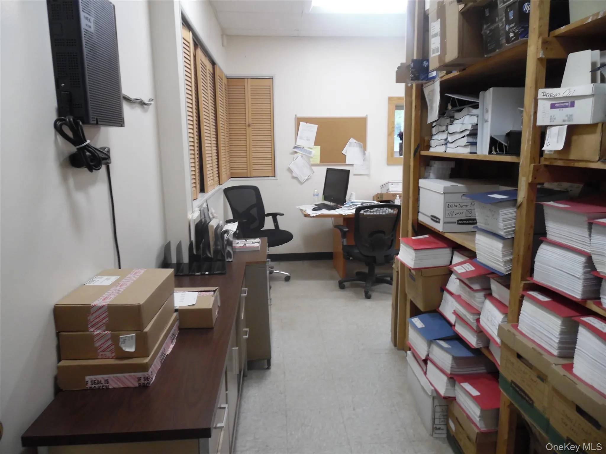 Office area featuring light flooring and baseboards Office area featuring light flooring and baseboards