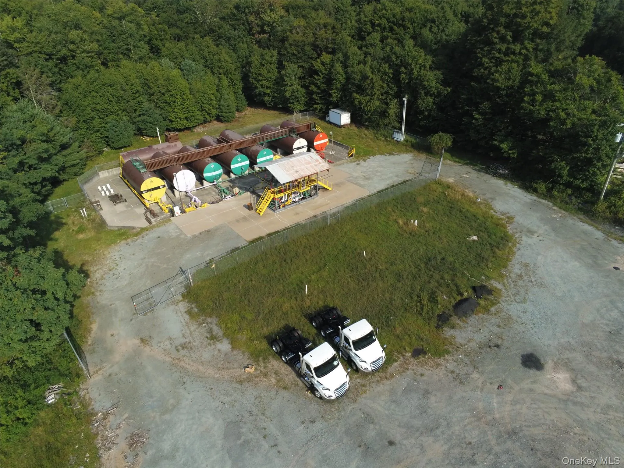 Aerial overview of property's location with a heavily wooded area Aerial overview of property's location with a heavily wooded area