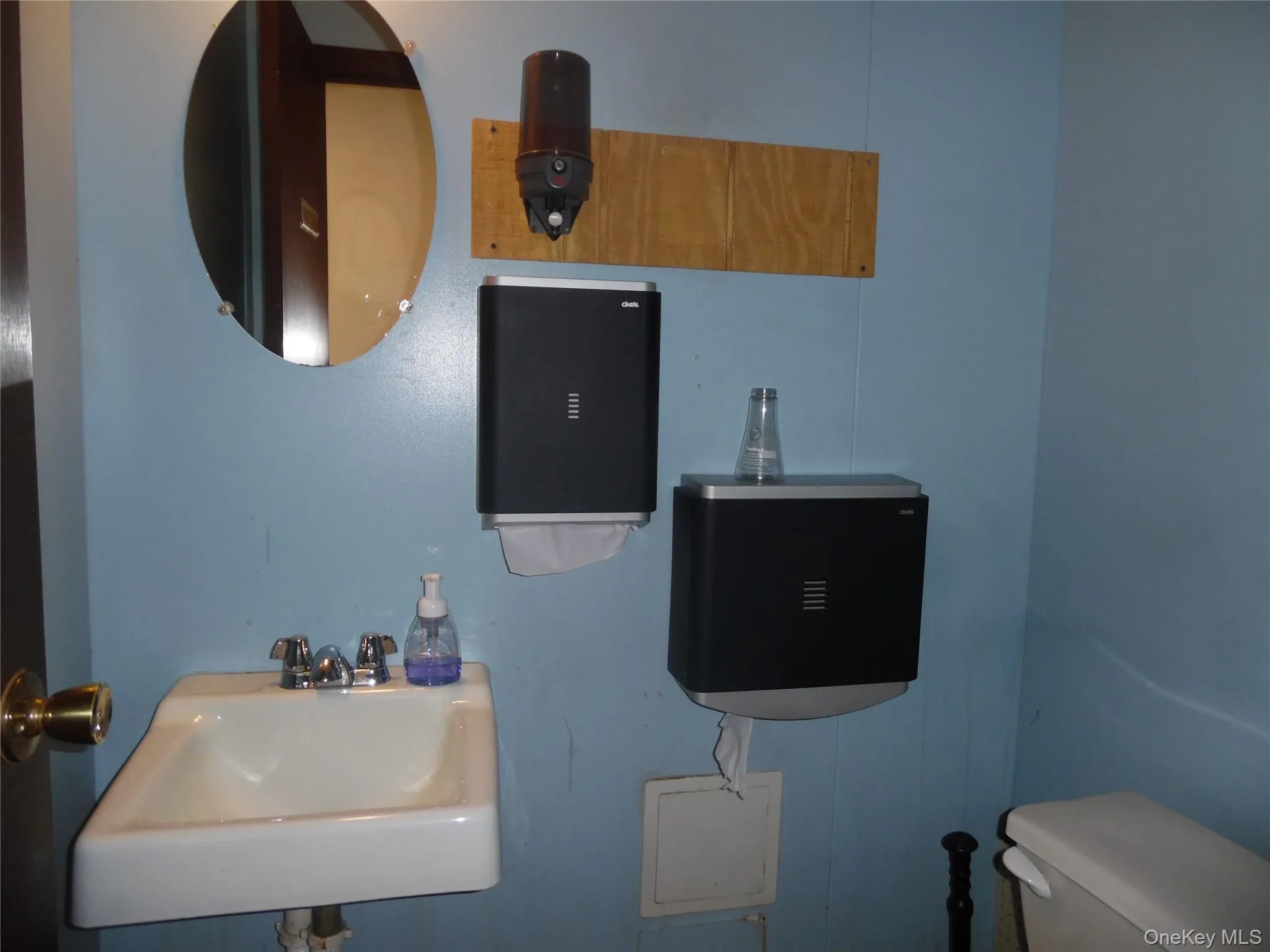 Bathroom featuring a sink and toilet Bathroom featuring a sink and toilet