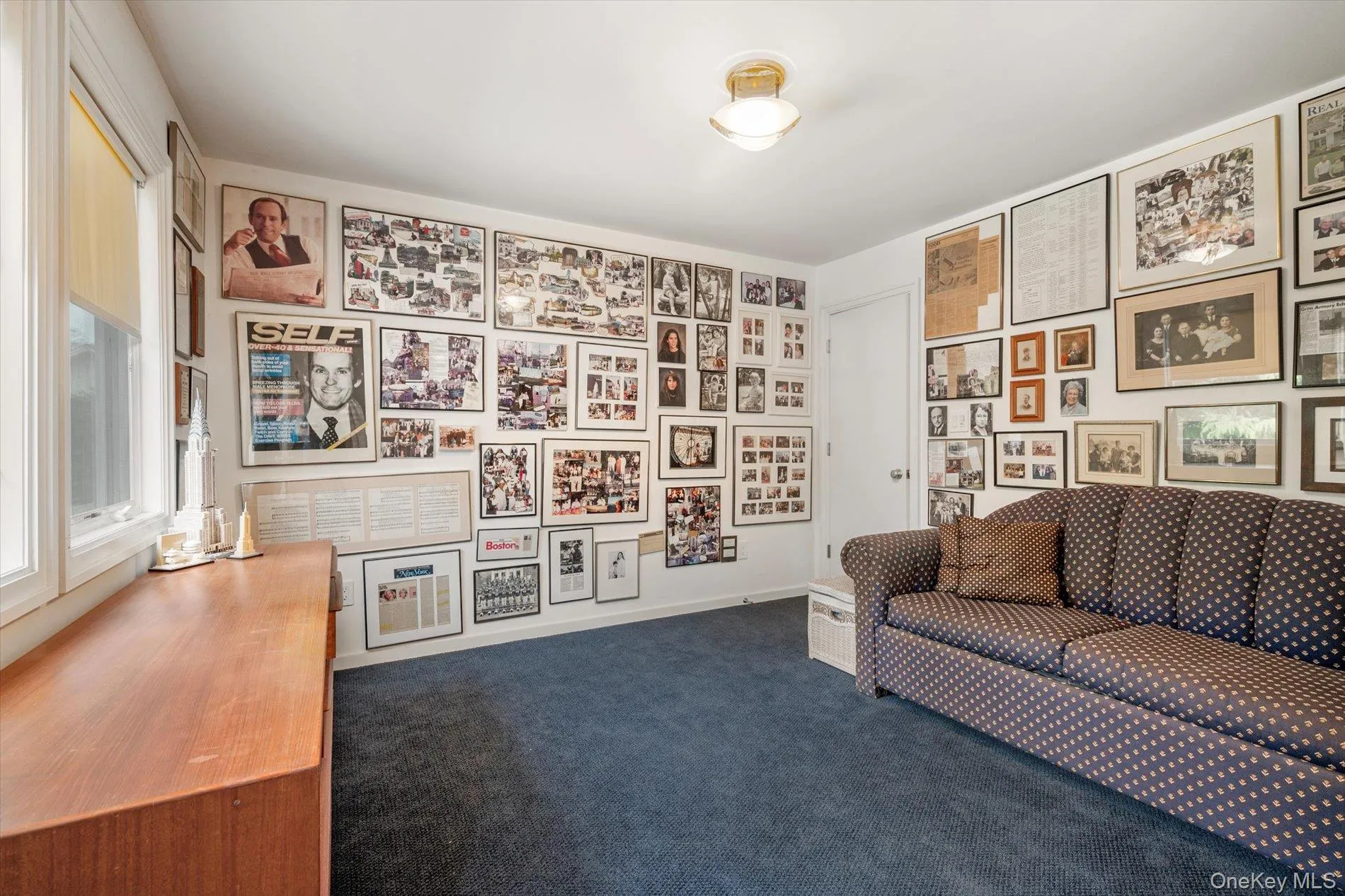 Sitting room with dark carpet Sitting room with dark carpet