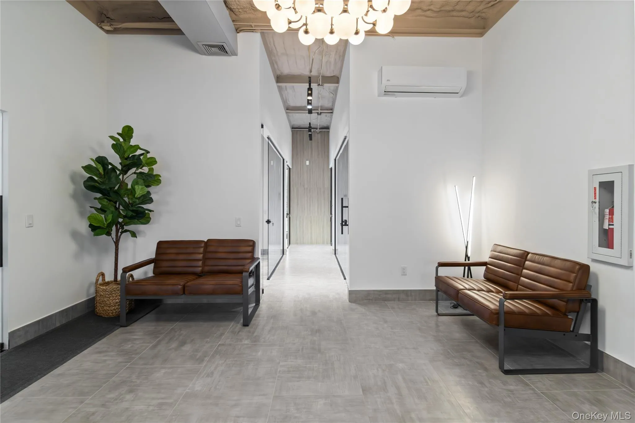 Building lobby with a high ceiling and beamed ceiling Building lobby with a high ceiling and beamed ceiling