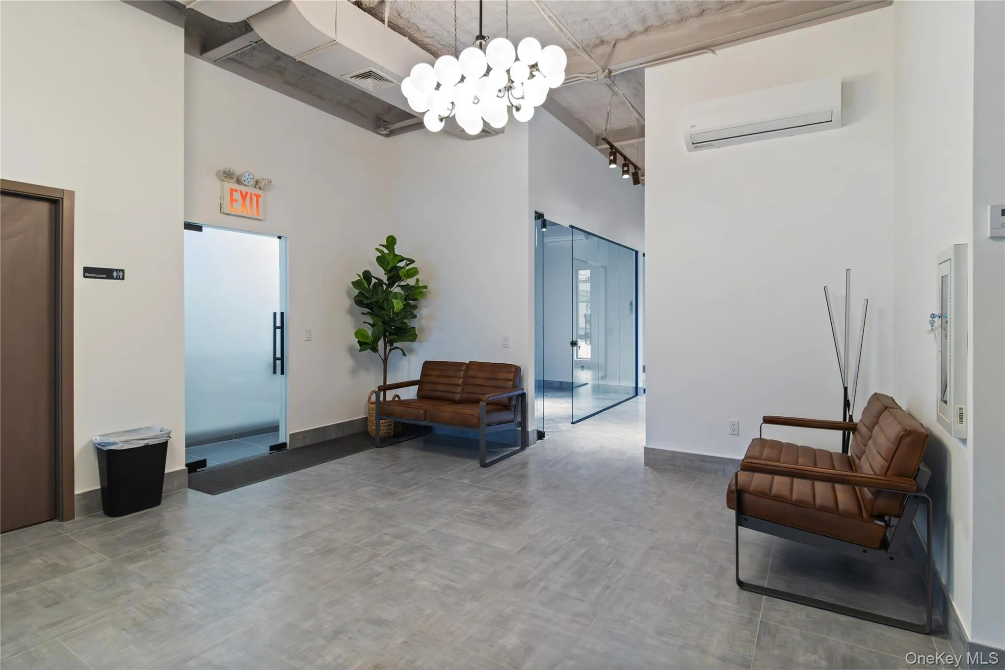 Lobby featuring a high ceiling Lobby featuring a high ceiling