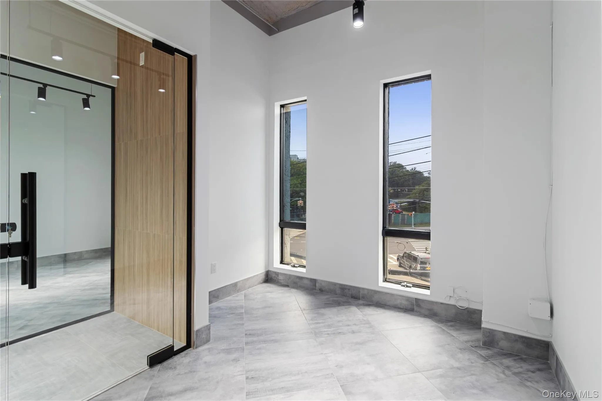 Spare room featuring baseboards Spare room featuring baseboards