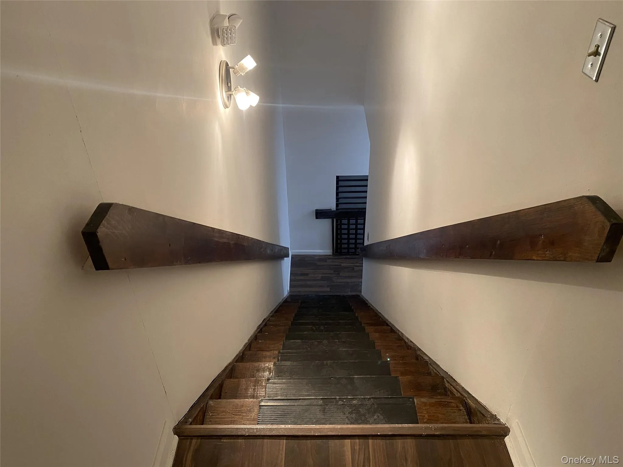 Stairway with hardwood / wood-style floors Stairway with hardwood / wood-style floors