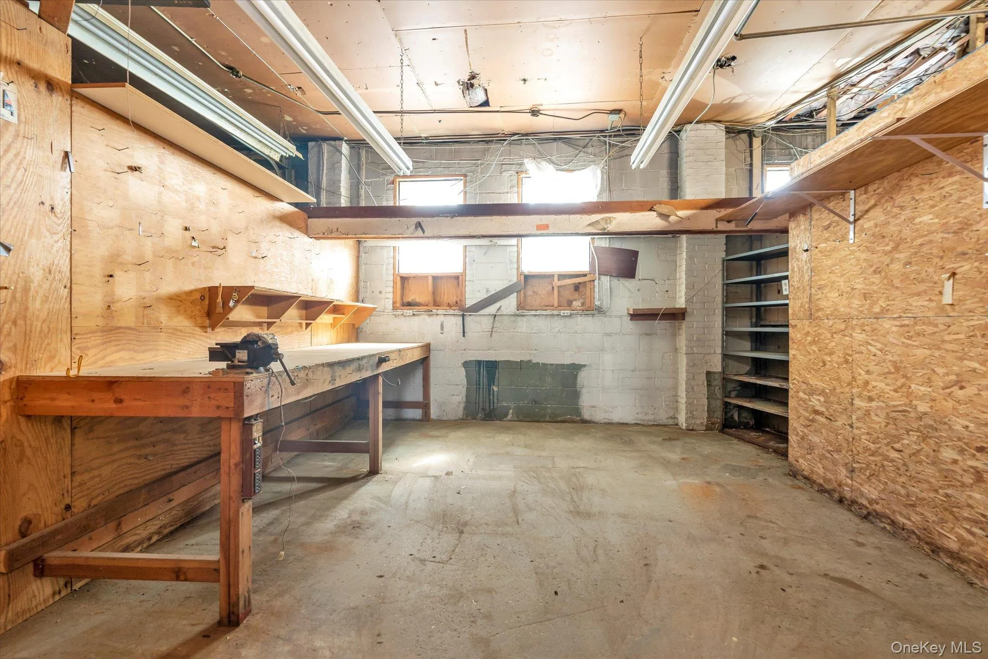 Basement with concrete block wall Basement with concrete block wall