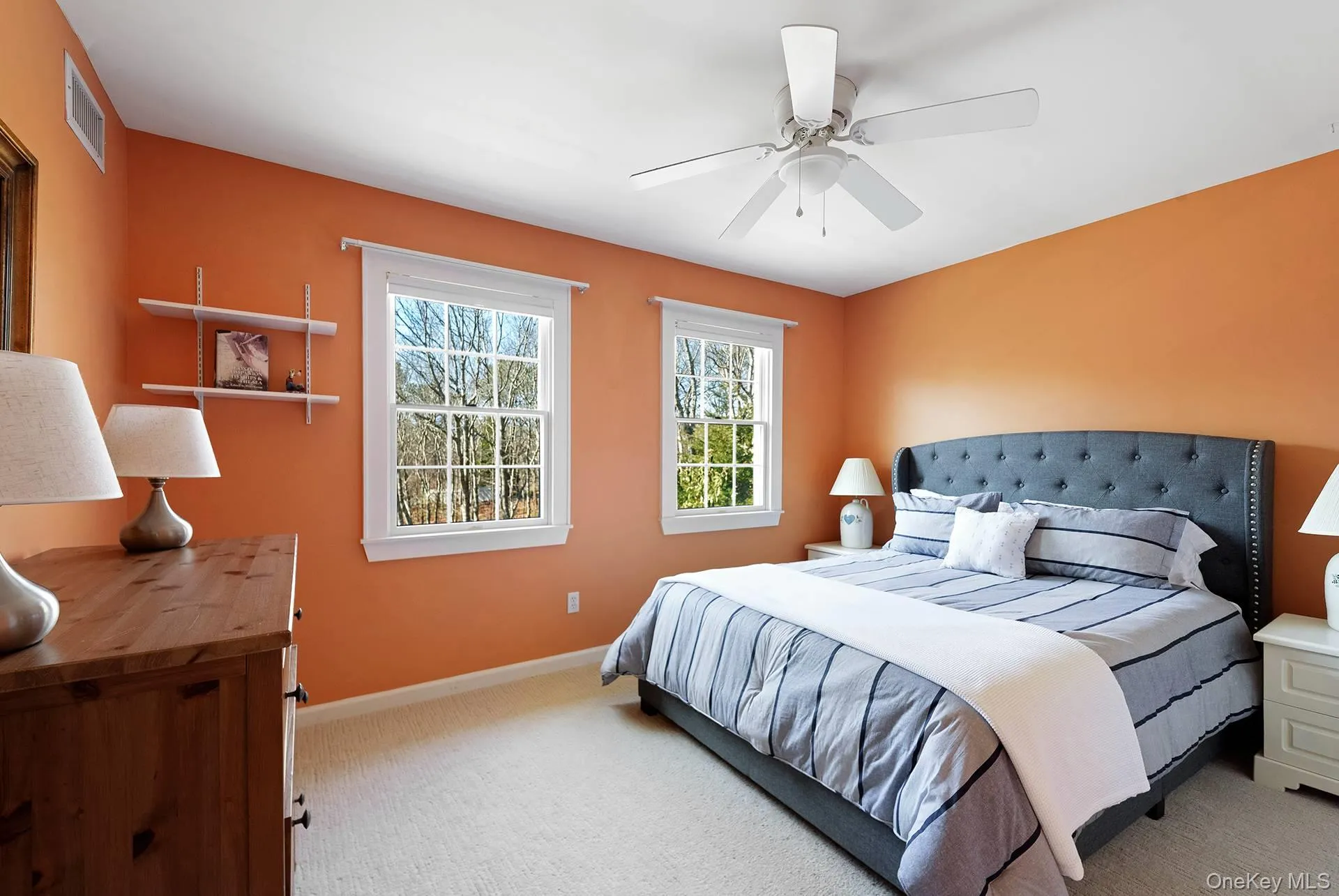 Bedroom with light carpet and ceiling fan Bedroom with light carpet and ceiling fan