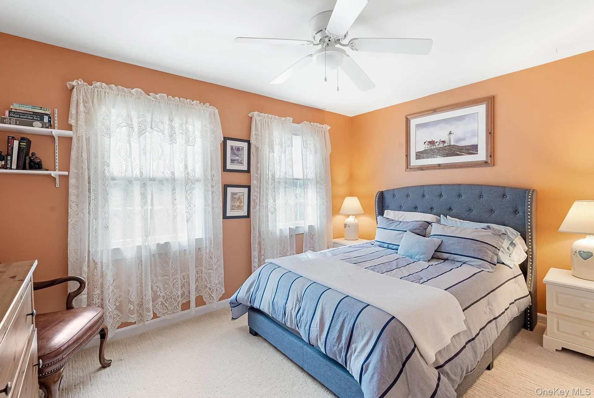 Carpeted bedroom with ceiling fan Carpeted bedroom with ceiling fan