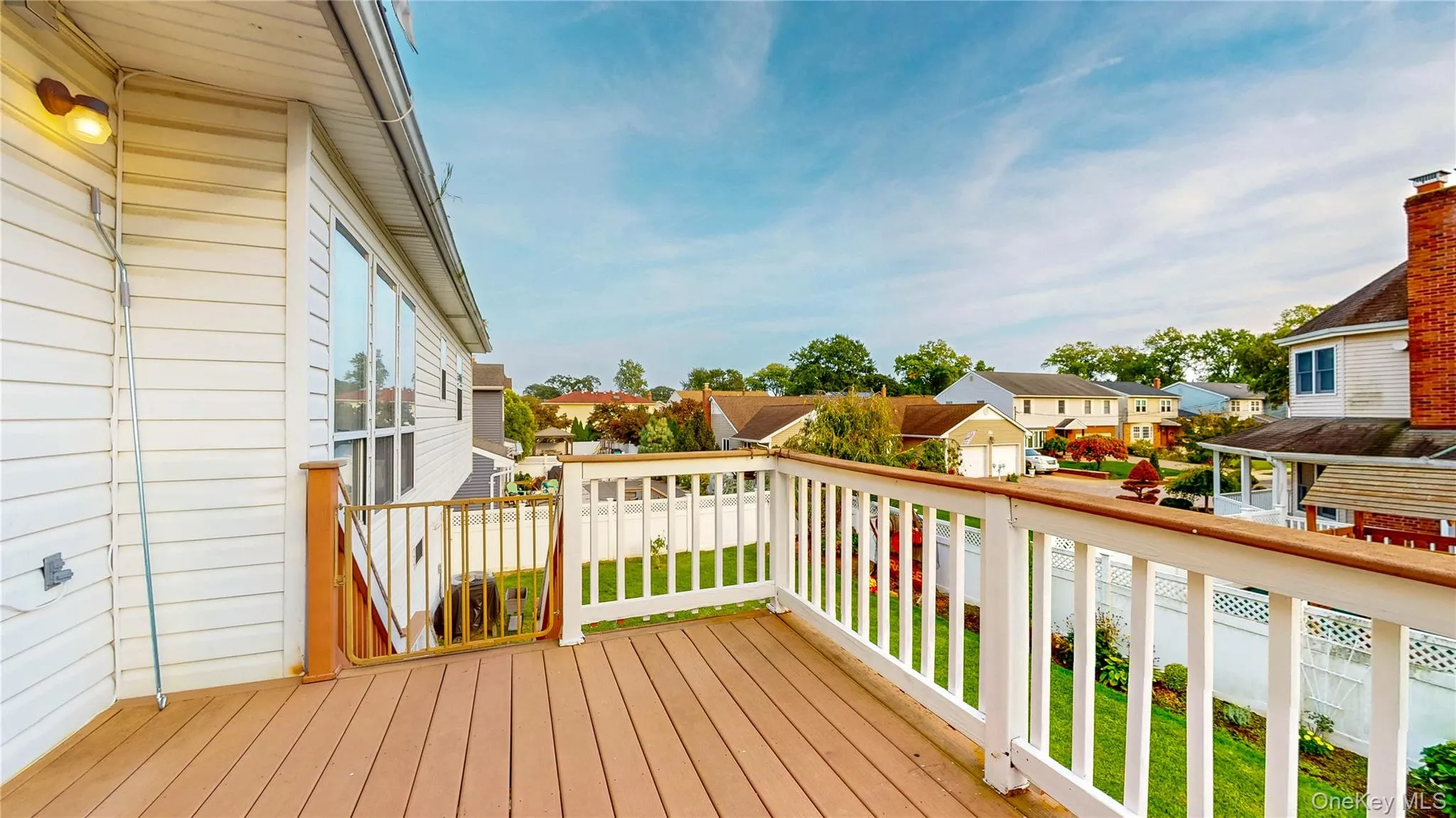 Wooden deck featuring a residential view Wooden deck featuring a residential view