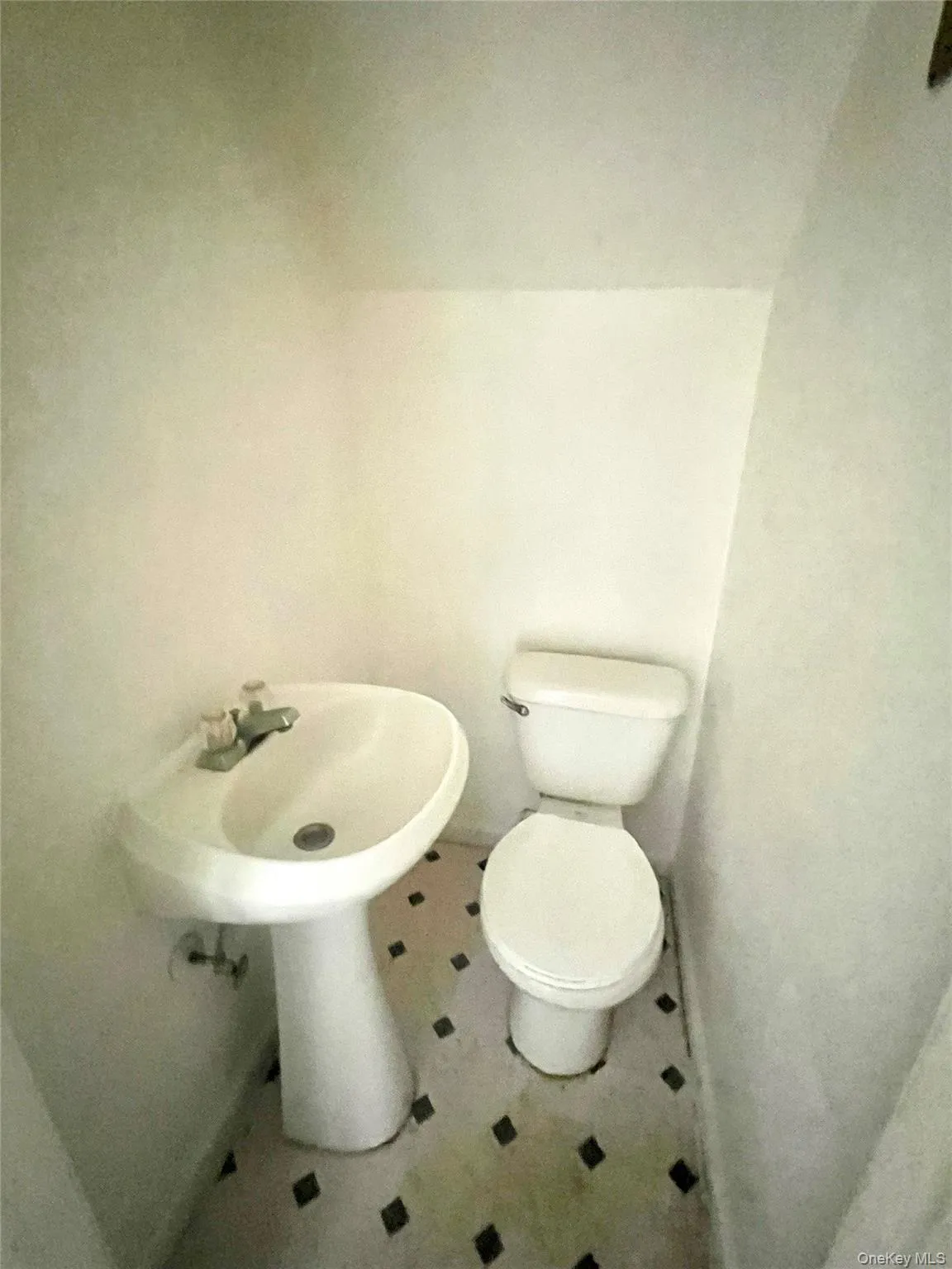 Half bathroom featuring toilet Half bathroom featuring toilet