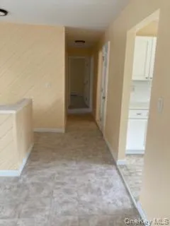 Hallway with baseboards Hallway with baseboards