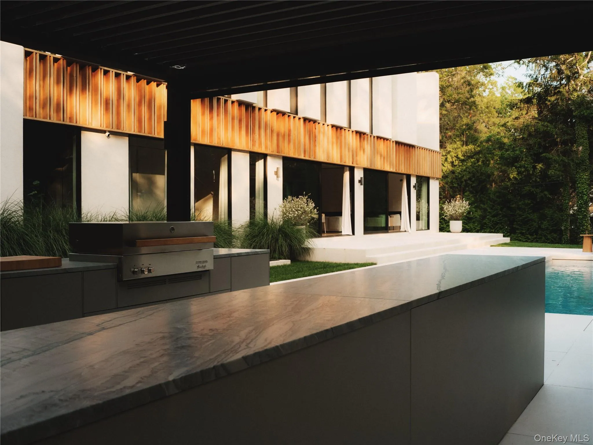 Outdoor kitchen w/ Green Egg, Gas Grill, & 2 refrigerators Outdoor kitchen w/ Green Egg, Gas Grill, & 2 refrigerators