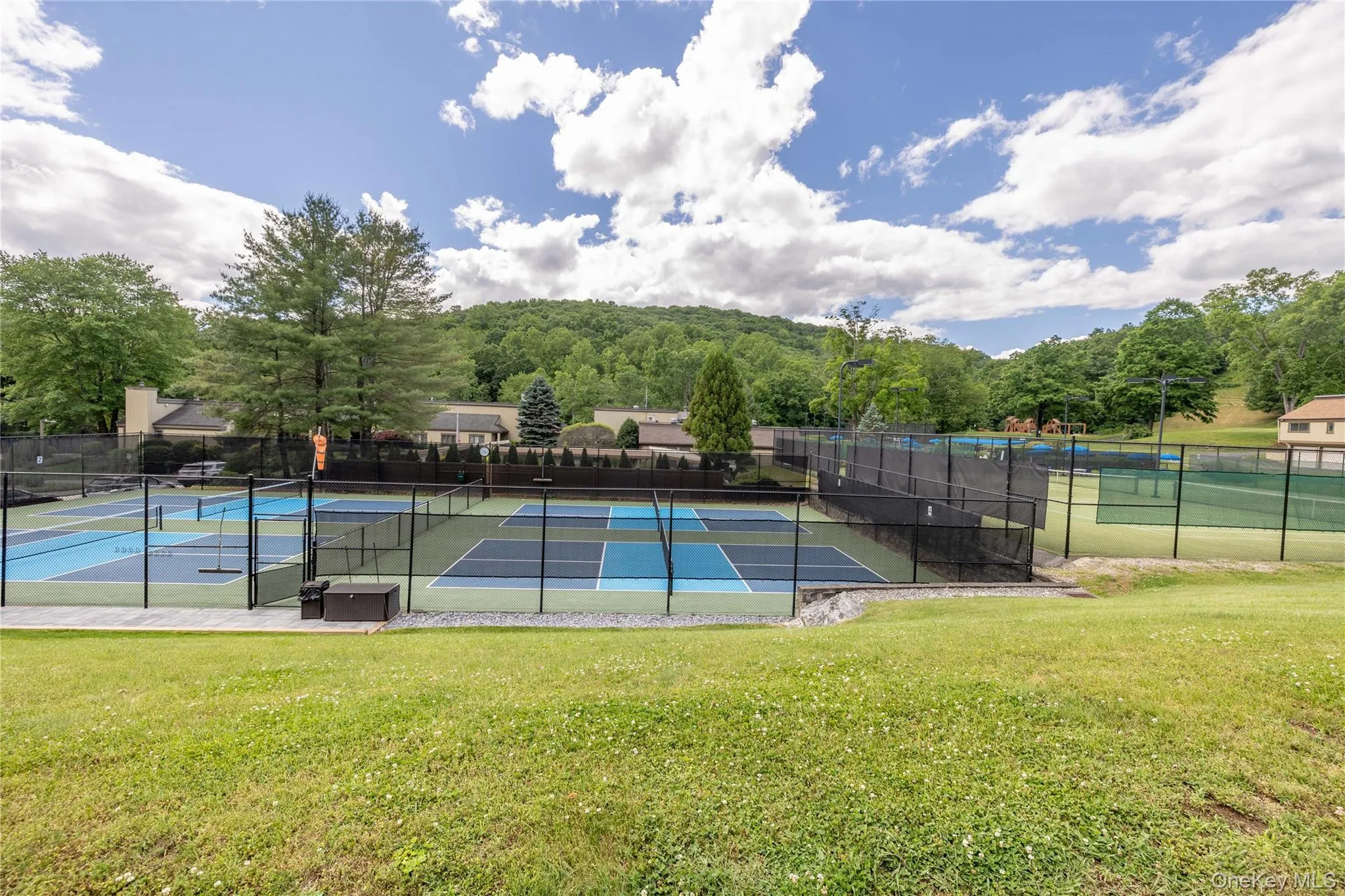 View of tennis court View of tennis court