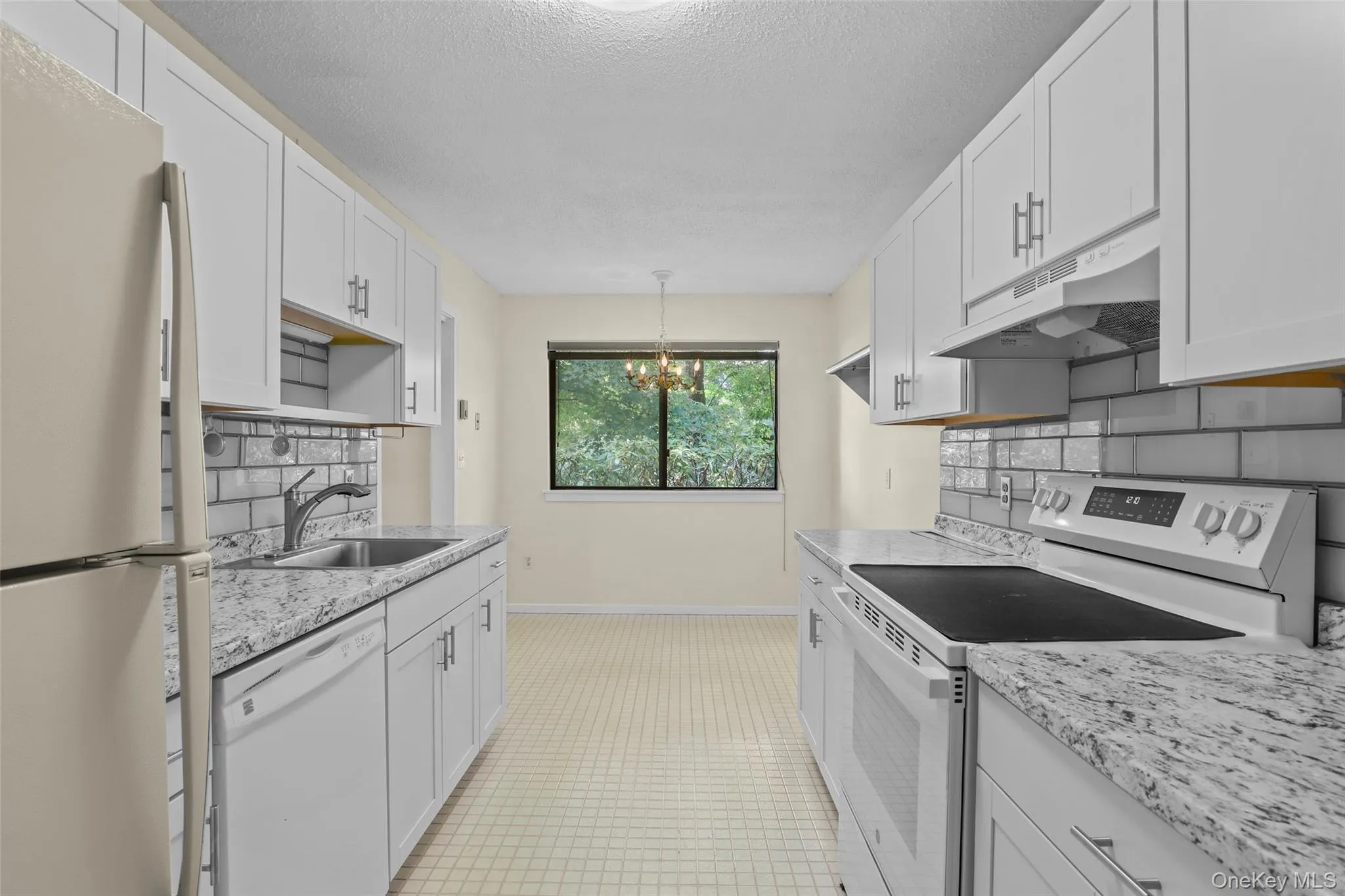 Kitchen featuring white appliances and Eat in Area Kitchen featuring white appliances and Eat in Area