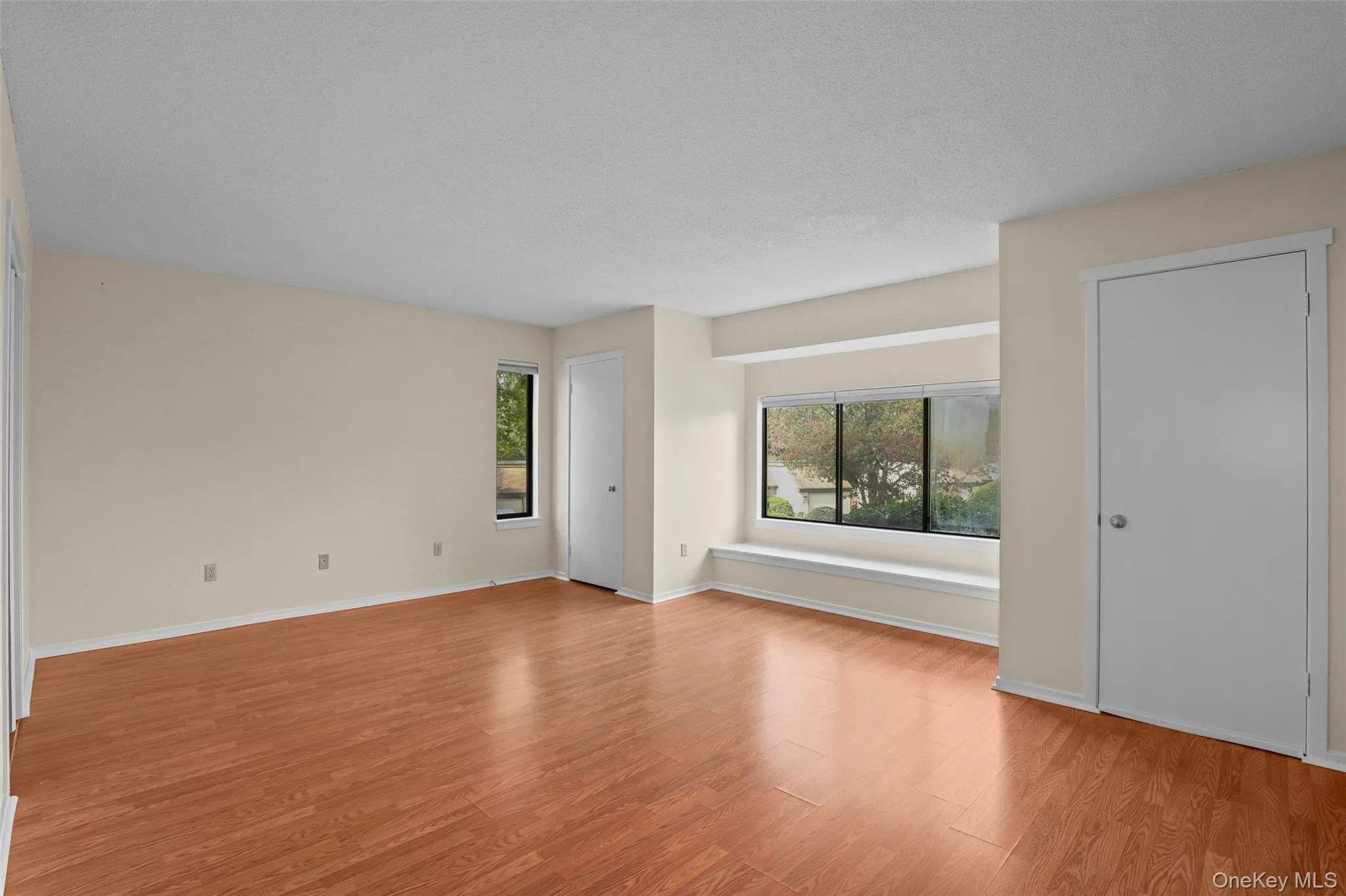 Primary Bedroom with a Bay window Primary Bedroom with a Bay window