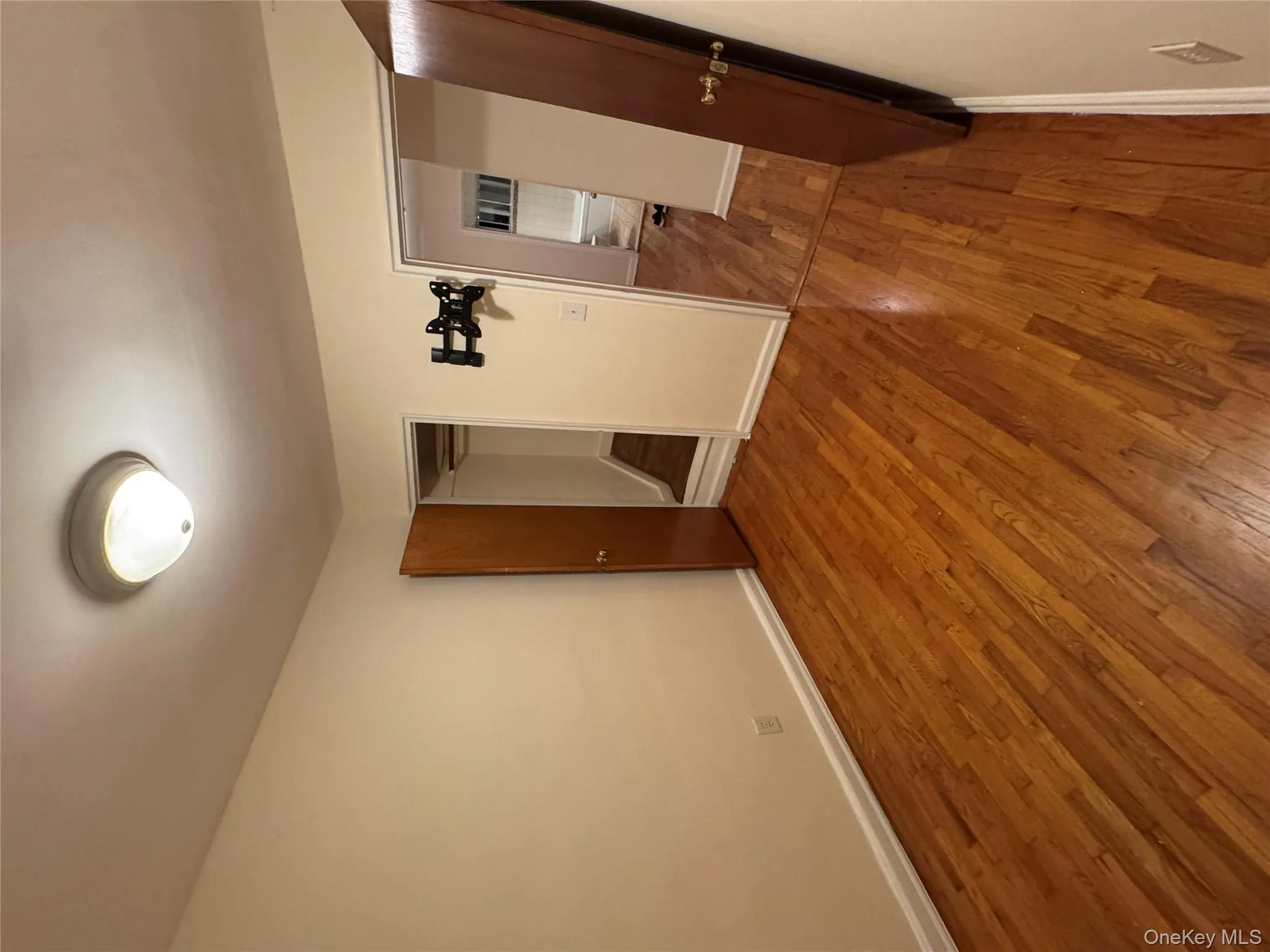 Unfurnished bedroom featuring light wood-type flooring and baseboards Unfurnished bedroom featuring light wood-type flooring and baseboards