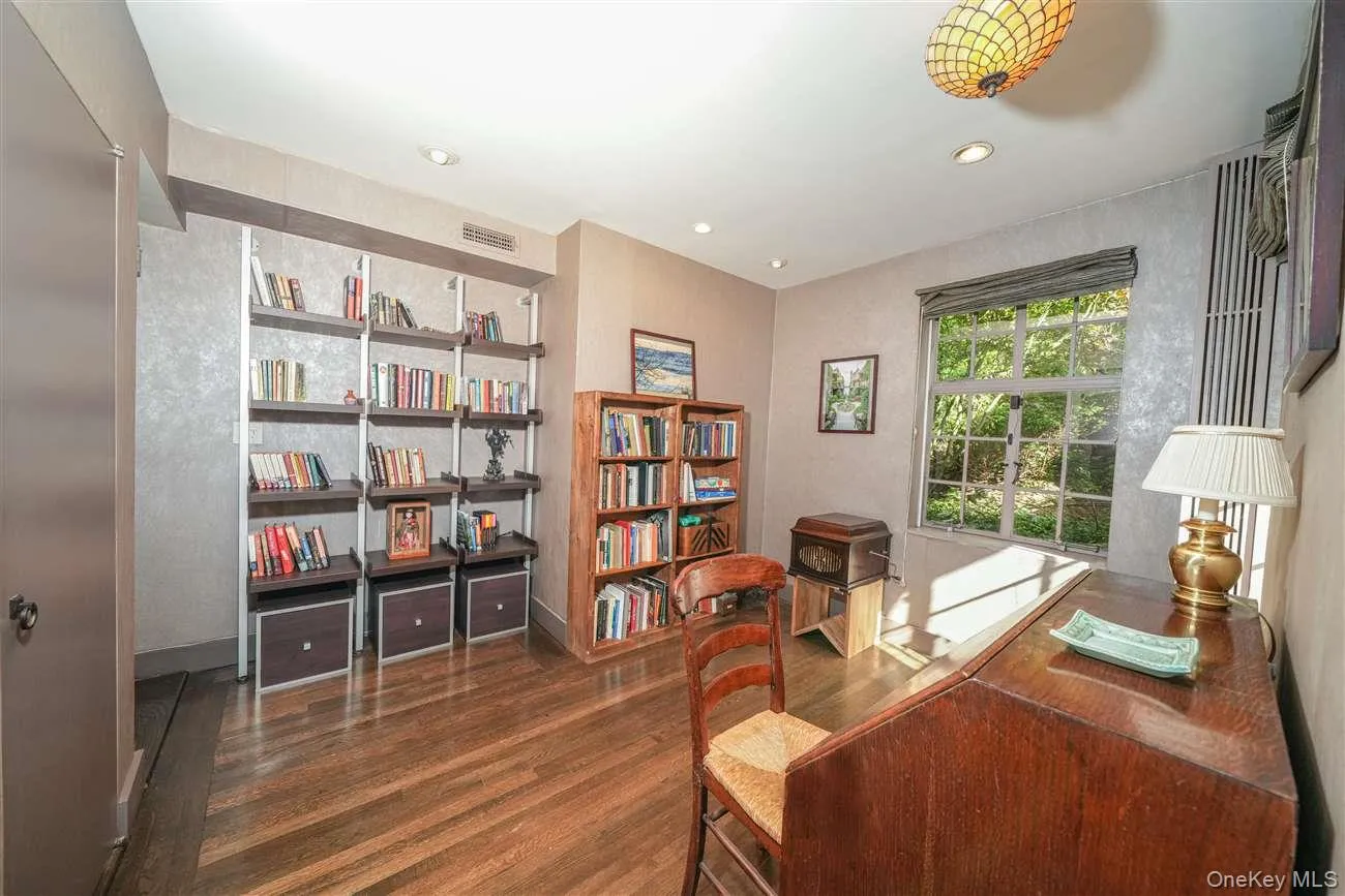 Home office featuring dark wood-type flooring and recessed lighting Home office featuring dark wood-type flooring and recessed lighting