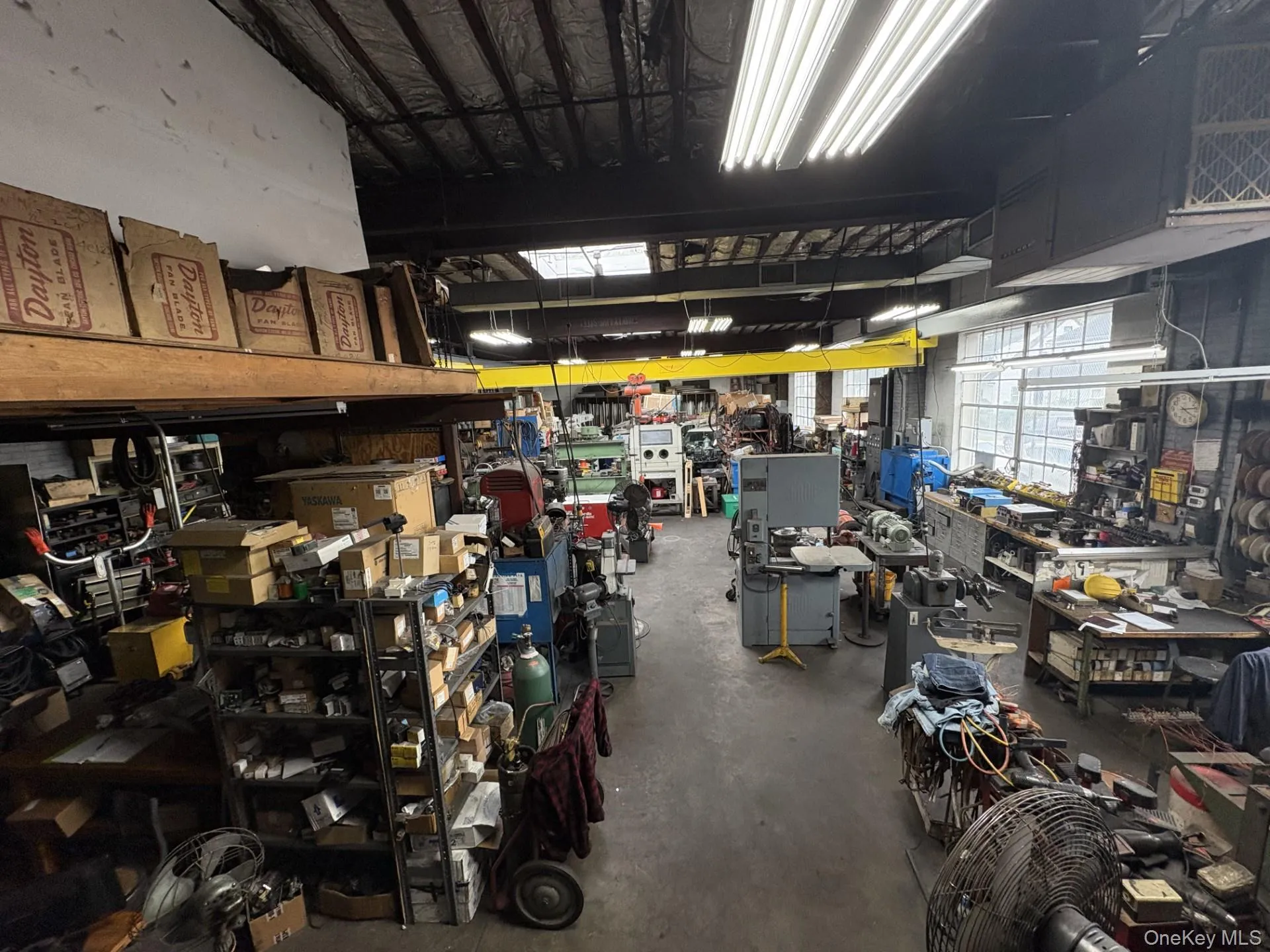 Garage featuring a workshop area Garage featuring a workshop area