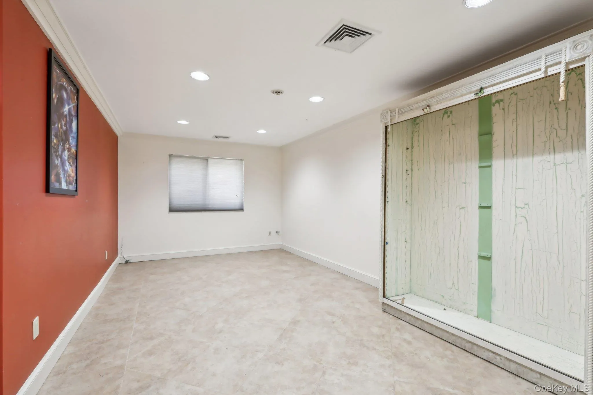 Unfurnished room with recessed lighting and light tile patterned floors Unfurnished room with recessed lighting and light tile patterned floors