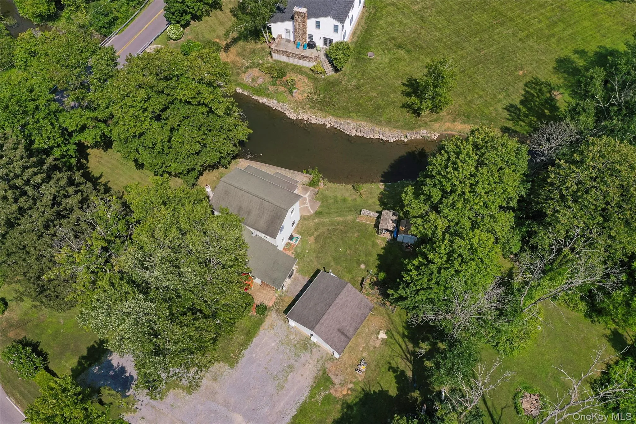 Aerial overview of property's location featuring a nearby body of water Aerial overview of property's location featuring a nearby body of water