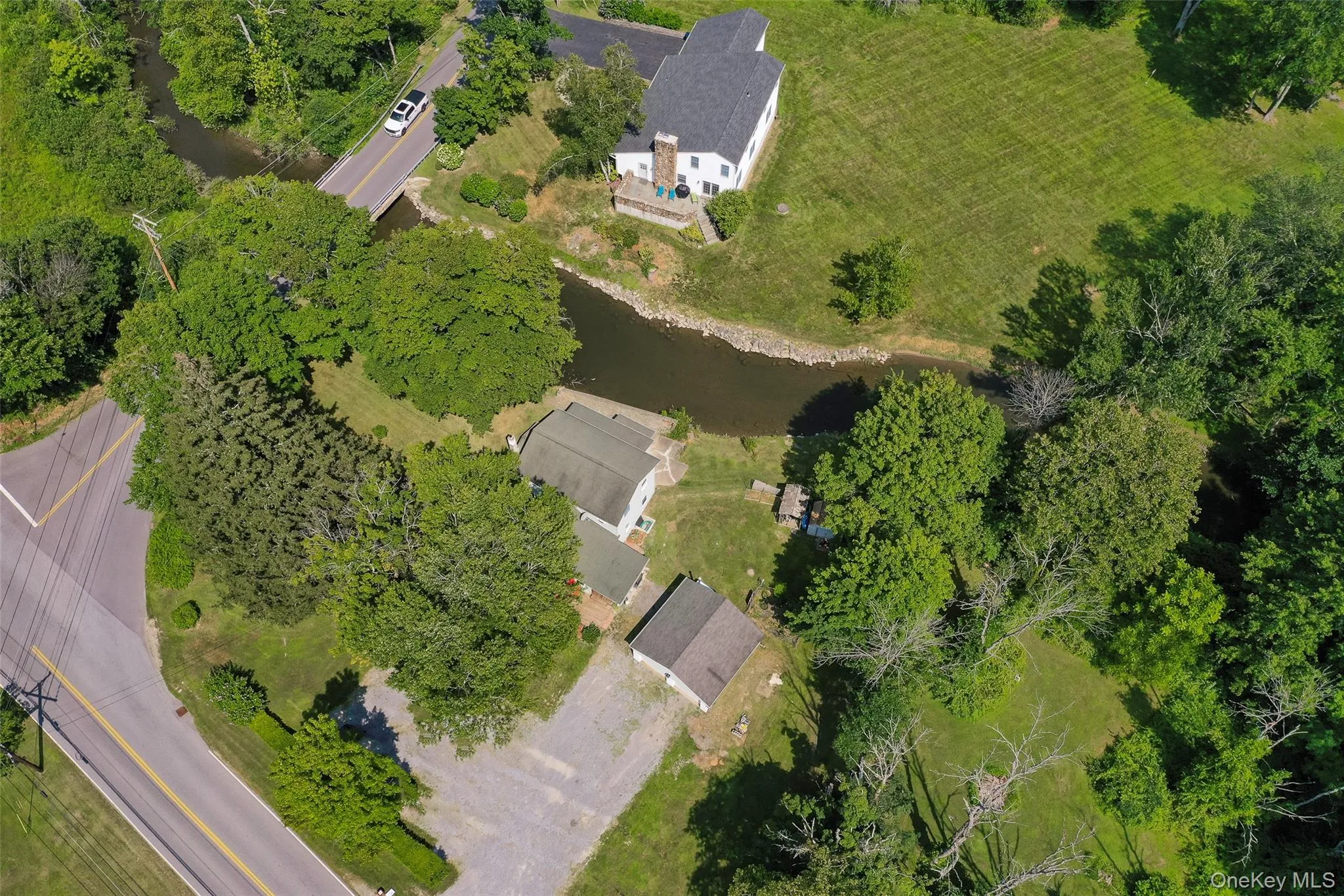Aerial view of property's location featuring a nearby body of water Aerial view of property's location featuring a nearby body of water