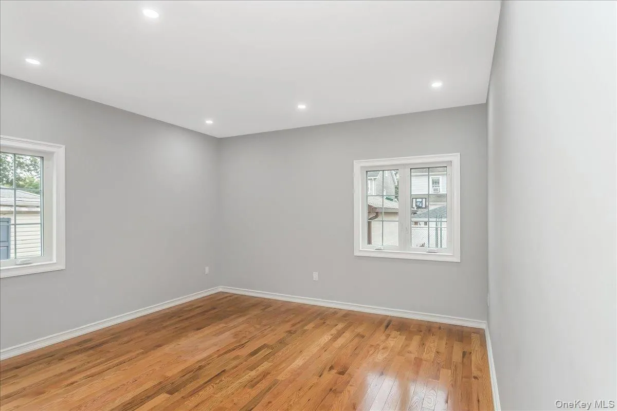 Unfurnished room featuring light wood-type flooring and recessed lighting Unfurnished room featuring light wood-type flooring and recessed lighting