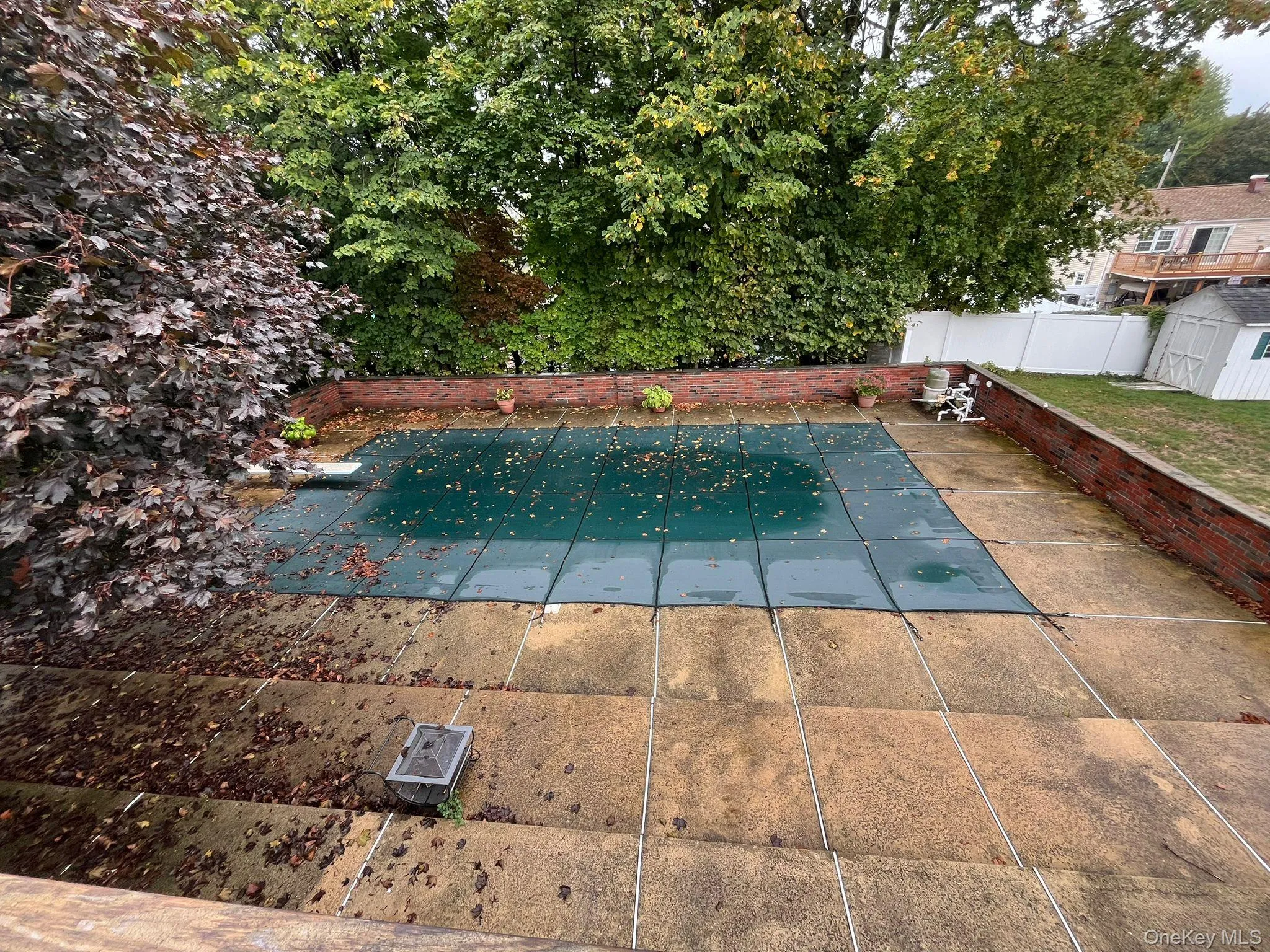 View of swimming pool with a fenced backyard View of swimming pool with a fenced backyard