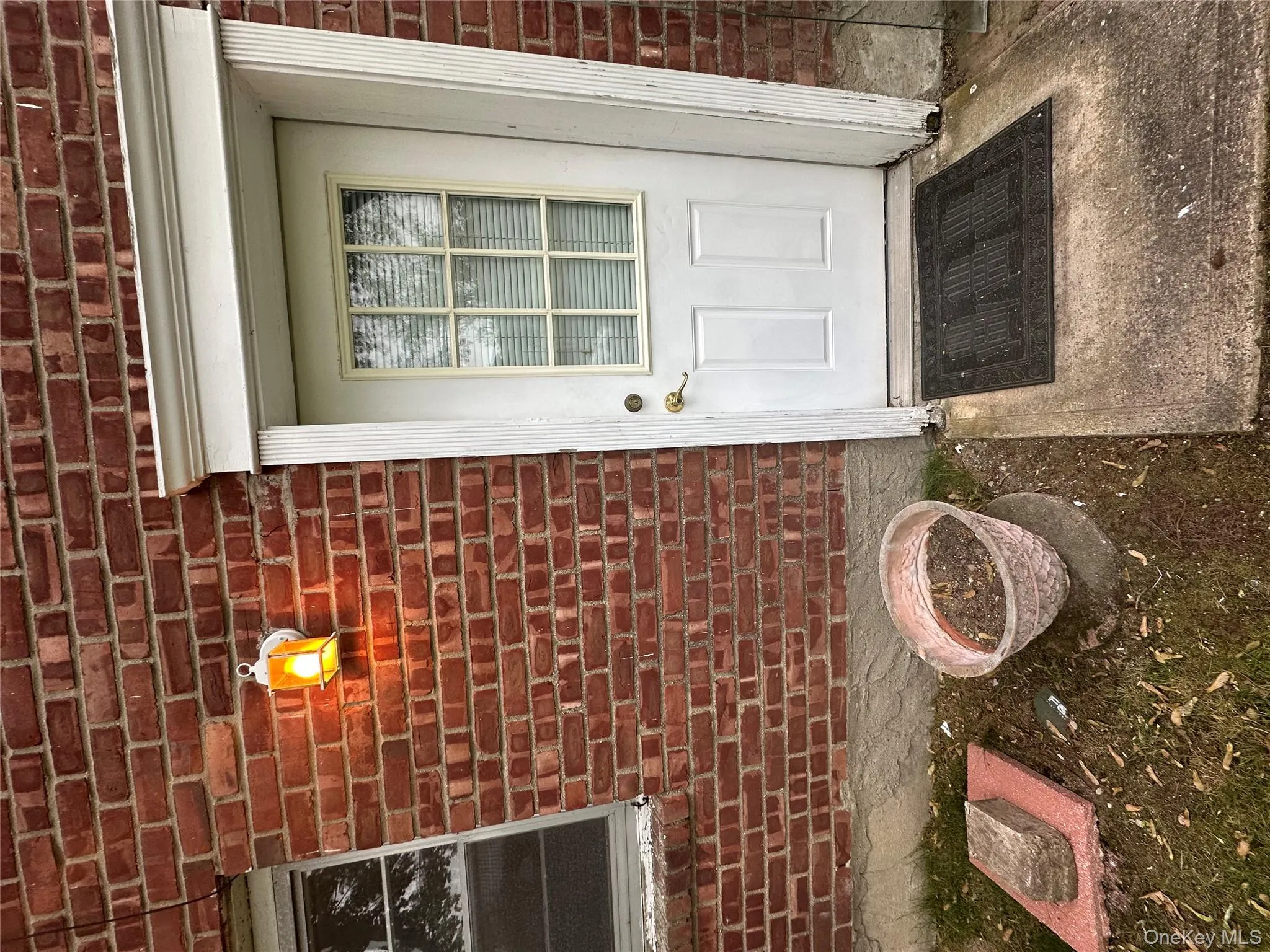 View of exterior entry with brick siding View of exterior entry with brick siding