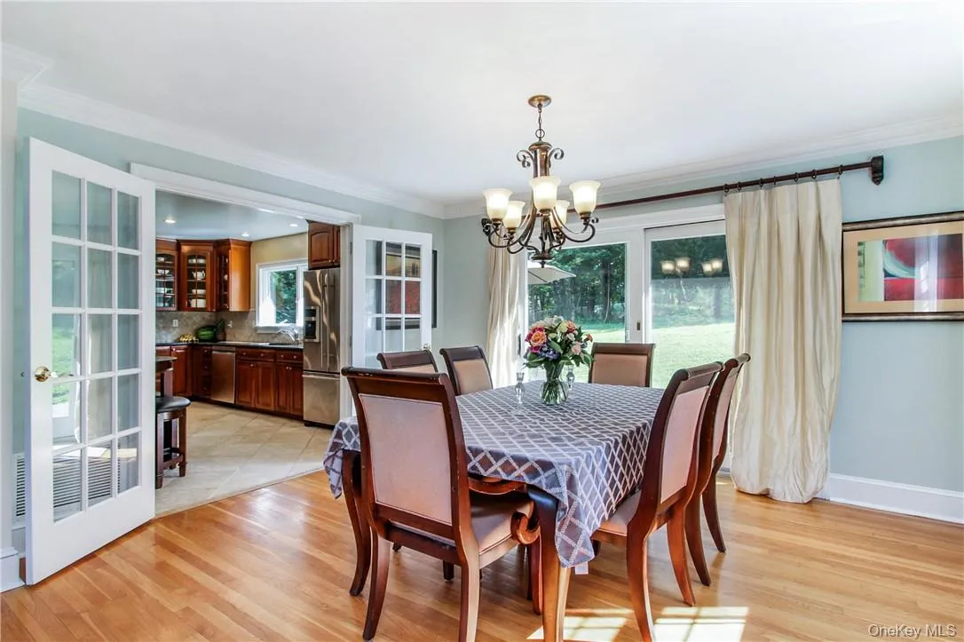 Hardwood floors and sliding glass doors to the patio Hardwood floors and sliding glass doors to the patio