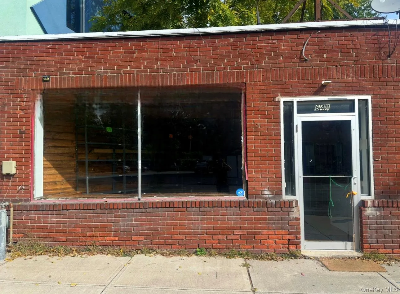 View of exterior entry with brick siding View of exterior entry with brick siding