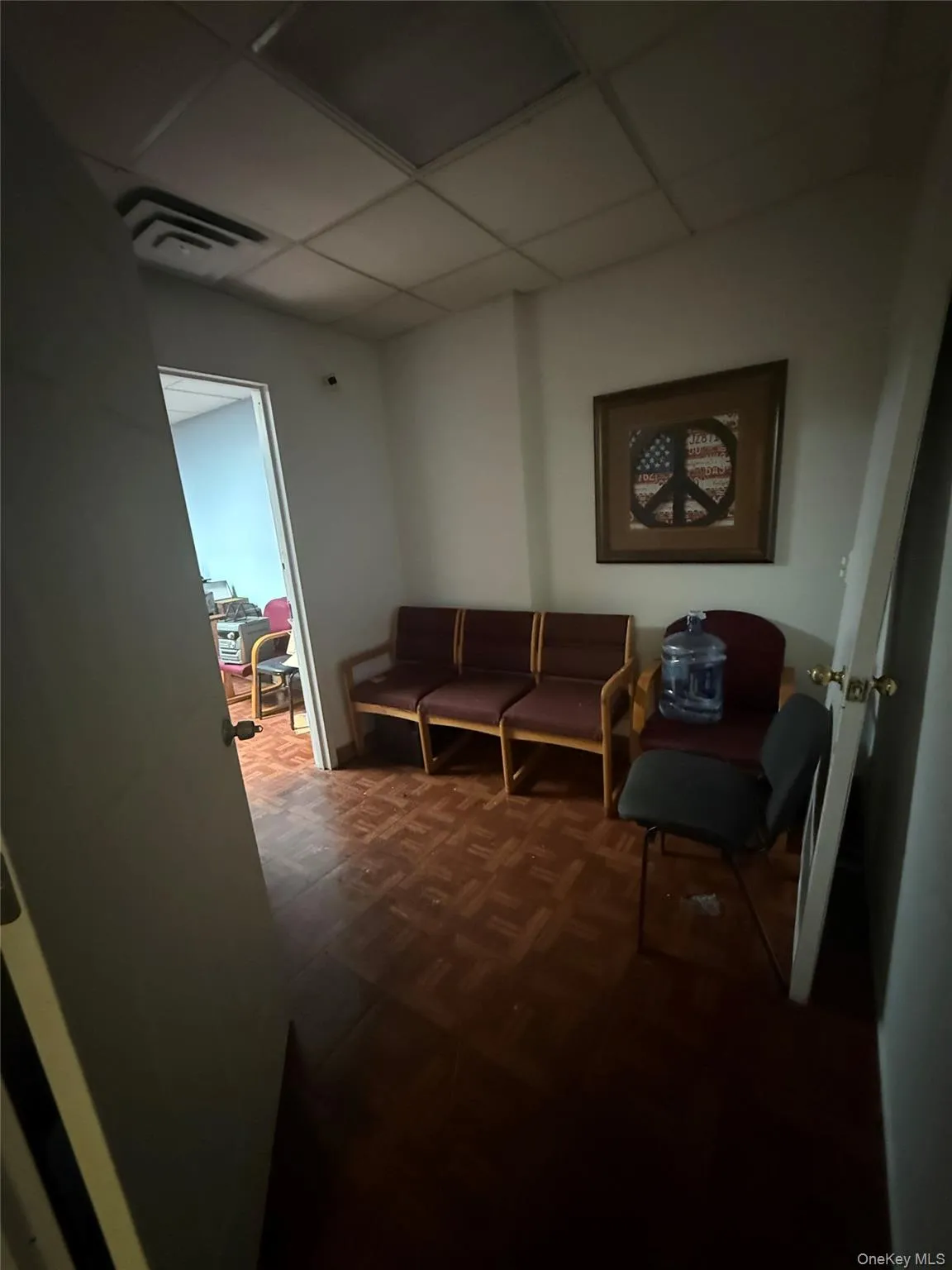 Sitting room with a drop ceiling Sitting room with a drop ceiling
