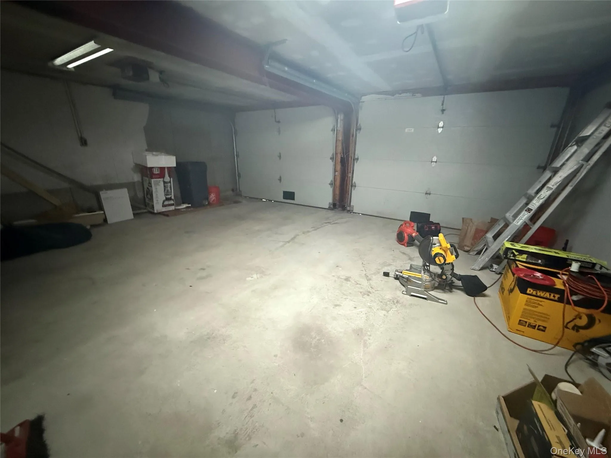 Garage with a garage door opener Garage with a garage door opener