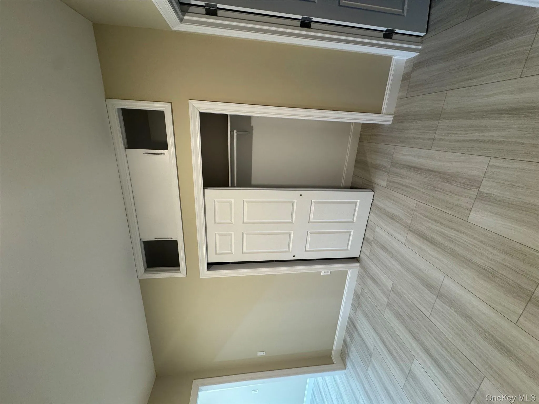 Unfurnished bedroom featuring a closet and wood finish floors Unfurnished bedroom featuring a closet and wood finish floors