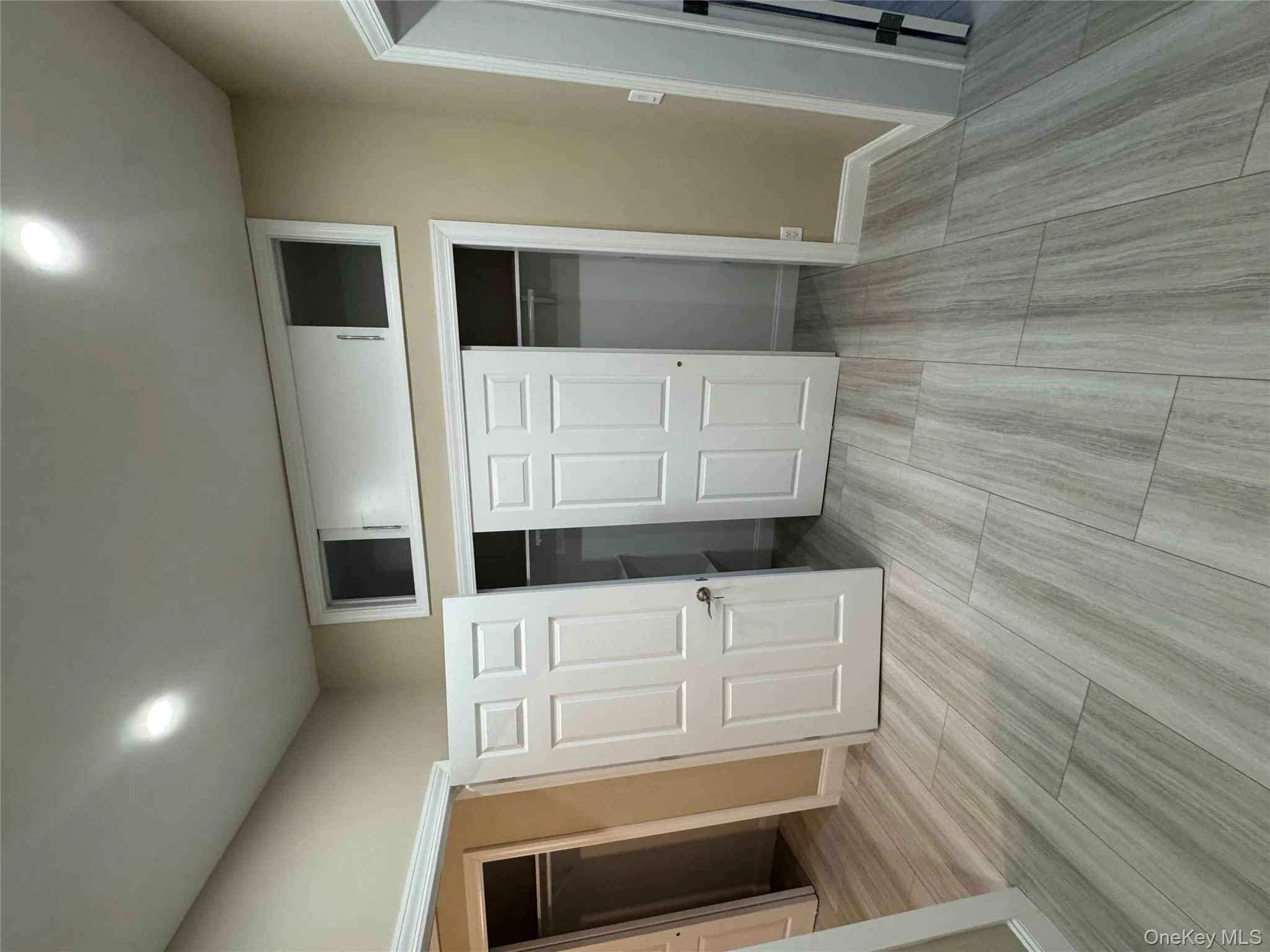 Unfurnished bedroom featuring a closet, wood finish floors, and recessed lighting Unfurnished bedroom featuring a closet, wood finish floors, and recessed lighting