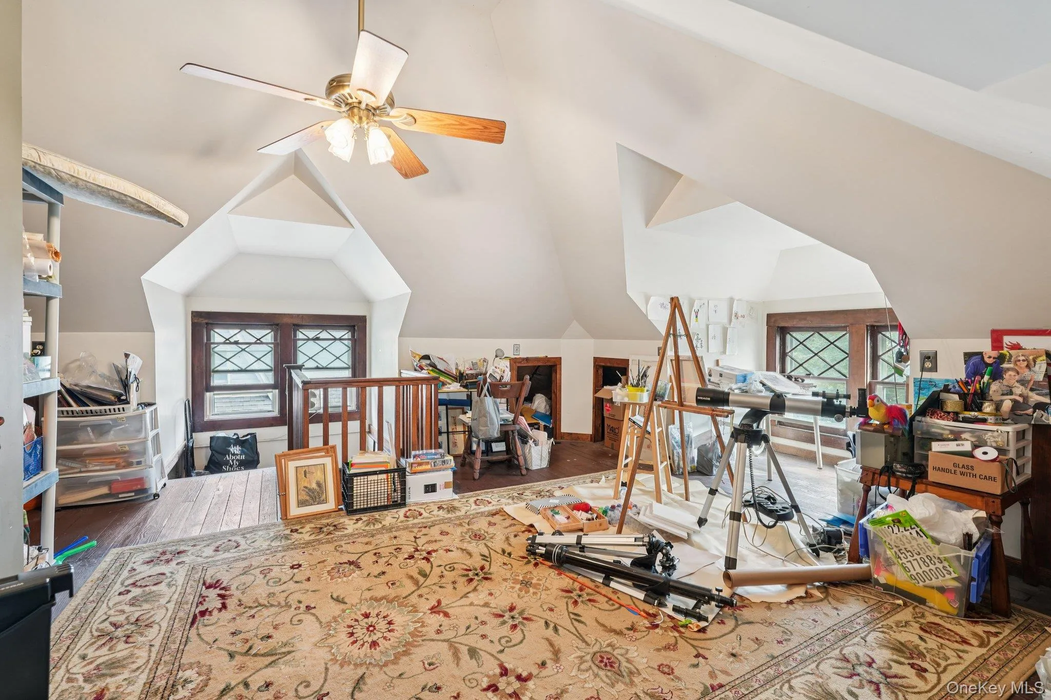 3rd Floor Guest Suite, Office, studio vaulted ceiling, and a ceiling fan 3rd Floor Guest Suite, Office, studio vaulted ceiling, and a ceiling fan