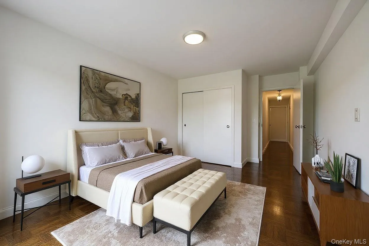Bedroom with a closet and baseboards Bedroom with a closet and baseboards