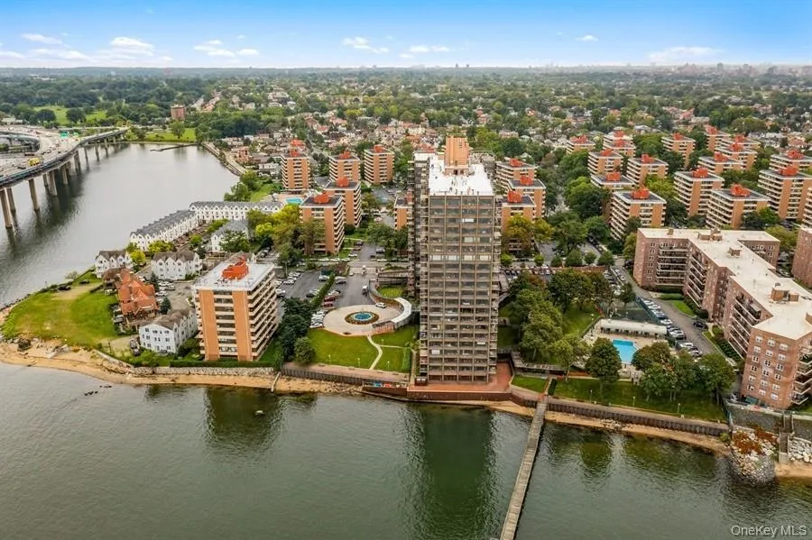 View of urban area featuring a large body of water View of urban area featuring a large body of water