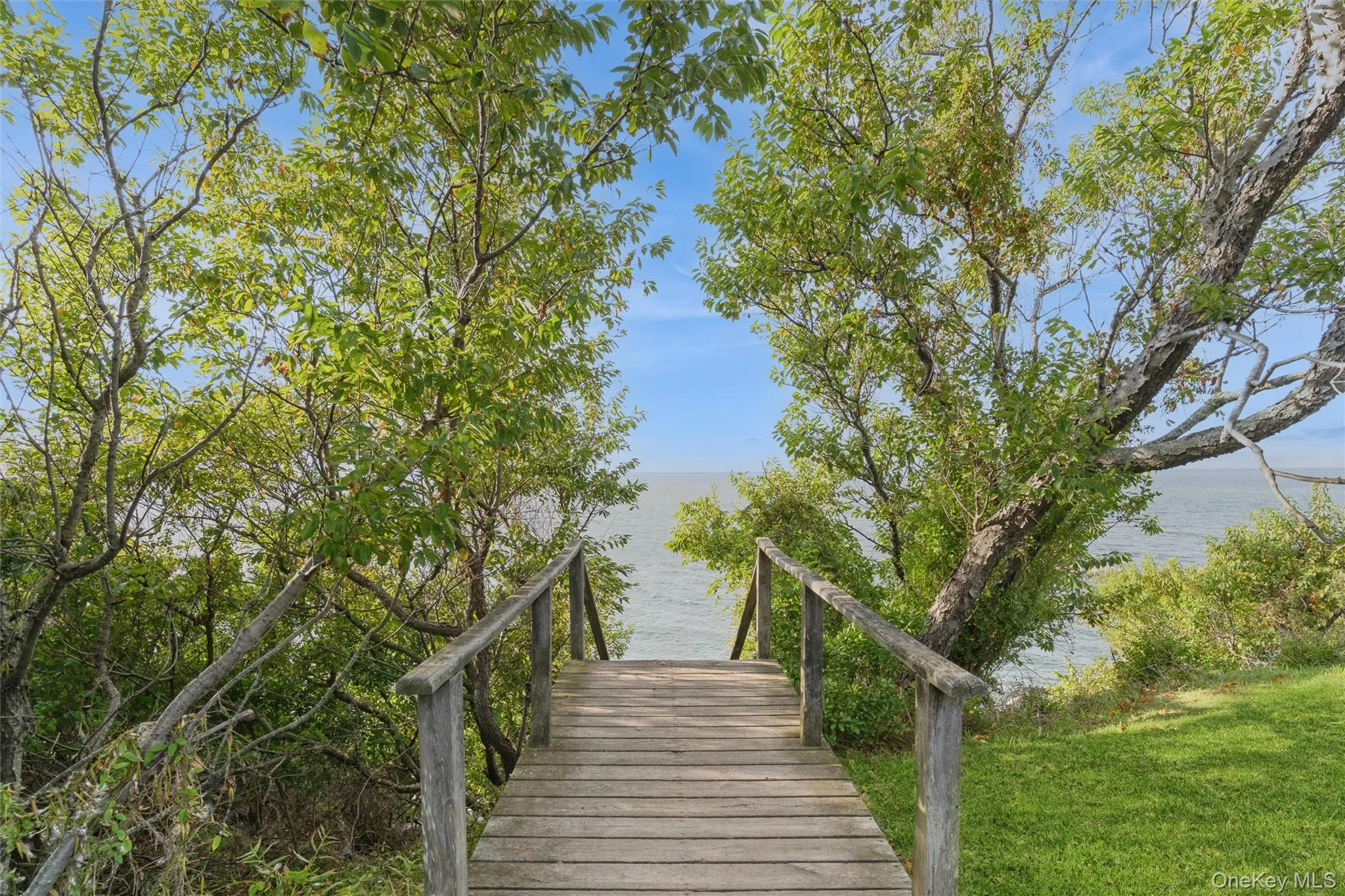 View of community featuring view of water and beach View of community featuring view of water and beach