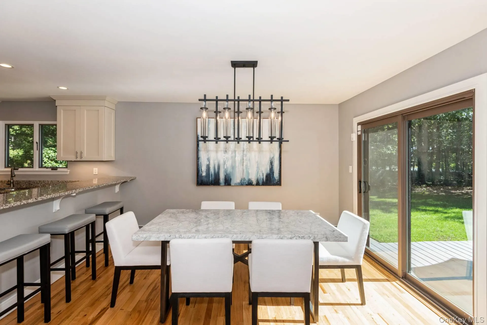 Dining area featuring light wood-type flooring and recessed lighting Dining area featuring light wood-type flooring and recessed lighting
