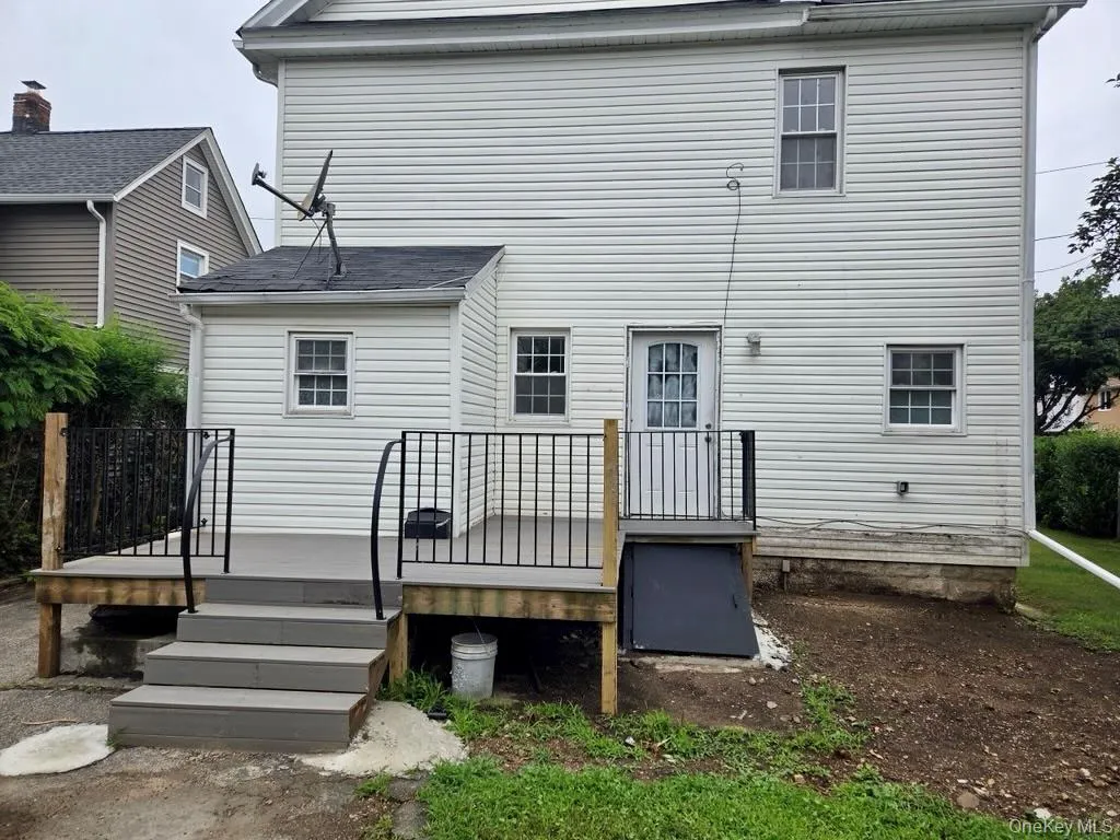 Back of house with a deck Back of house with a deck