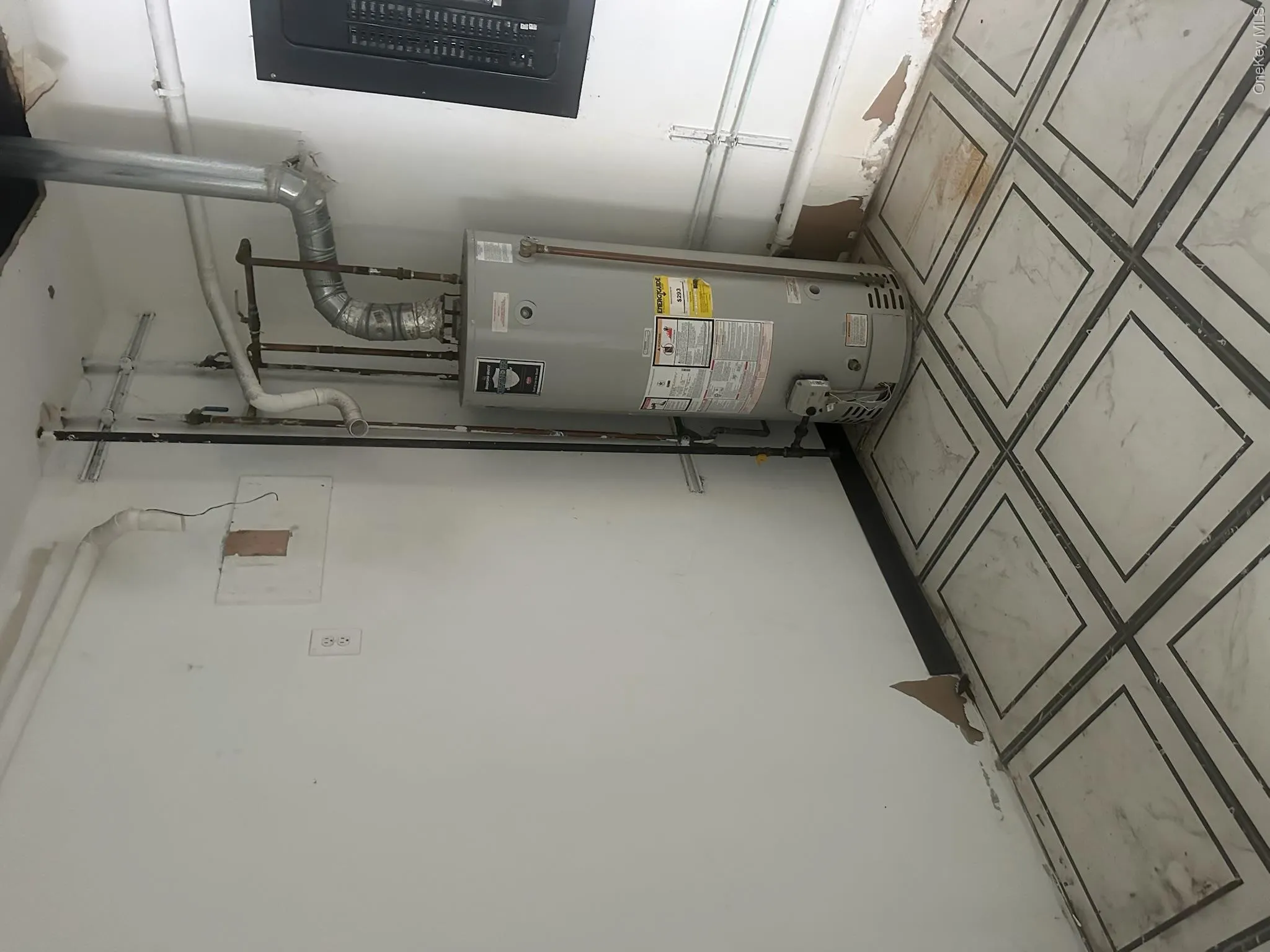 Utilities featuring gas water heater and electric panel Utilities featuring gas water heater and electric panel