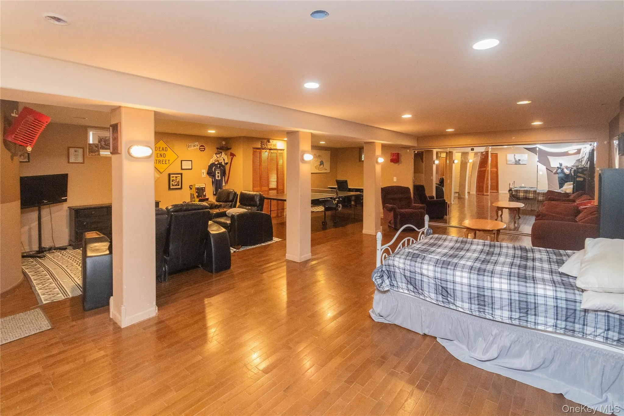 Bedroom featuring recessed lighting and light wood finished floors Bedroom featuring recessed lighting and light wood finished floors