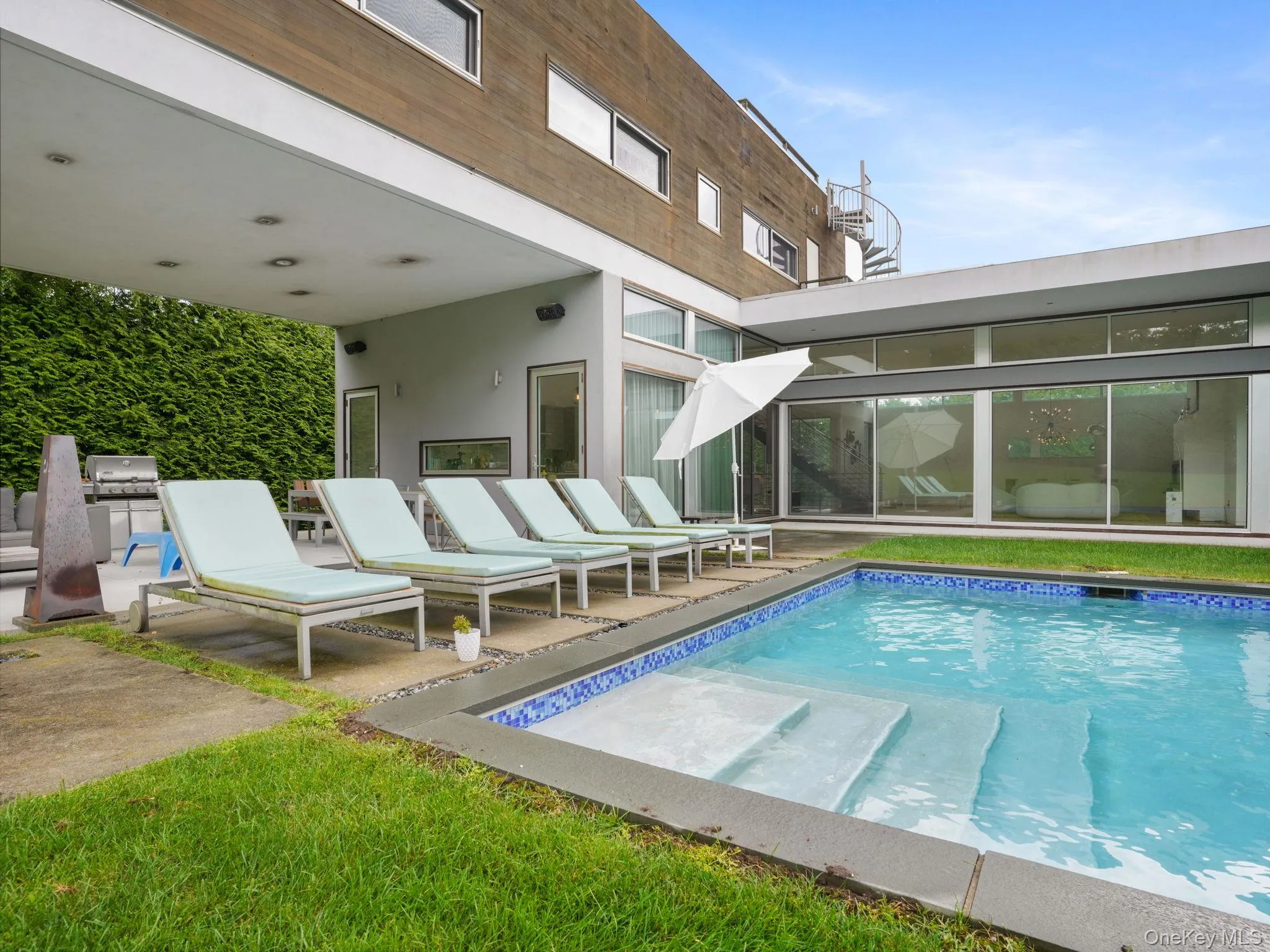 Outdoor pool featuring a patio Outdoor pool featuring a patio