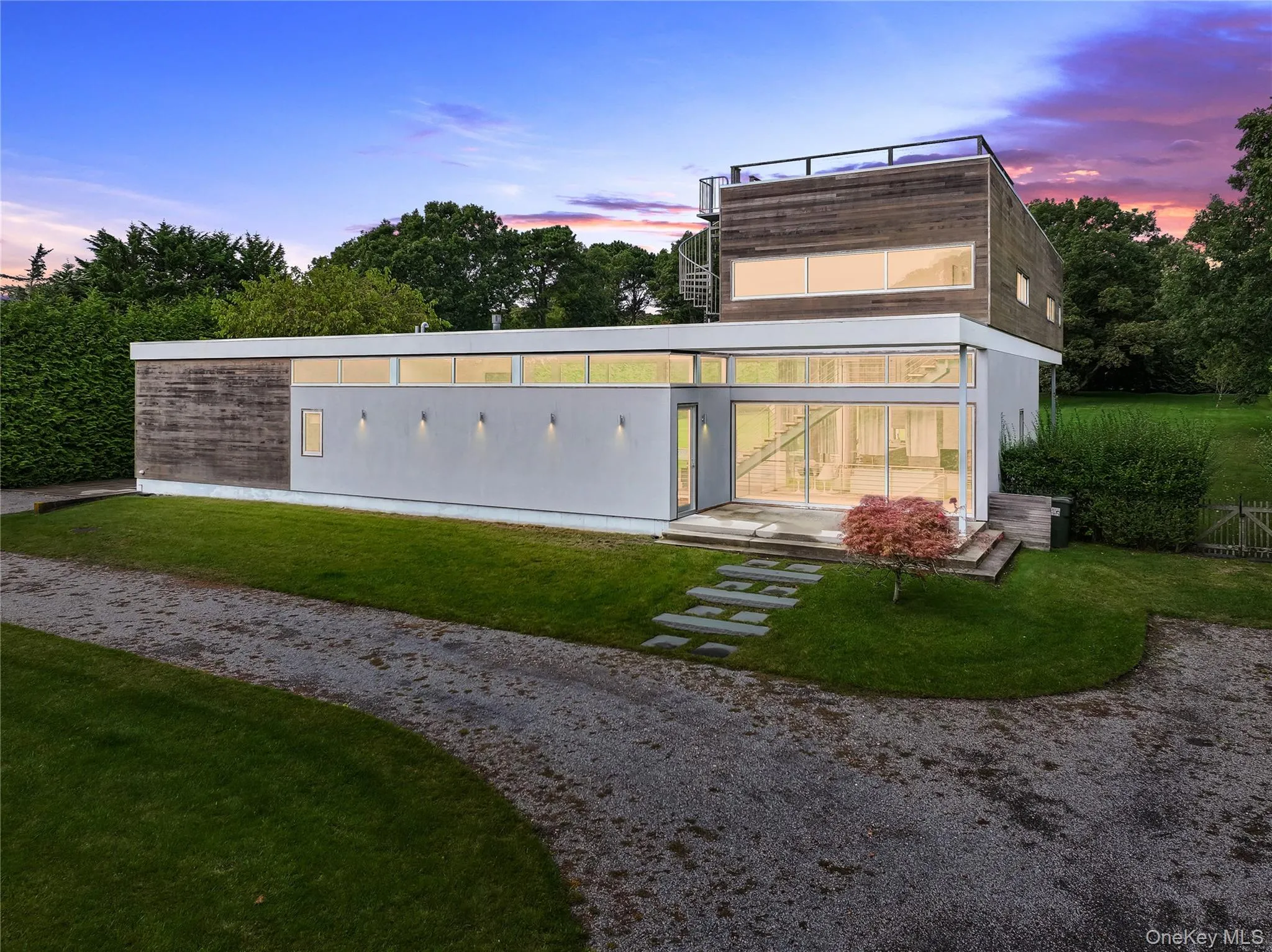 Back of property with a lawn Back of property with a lawn