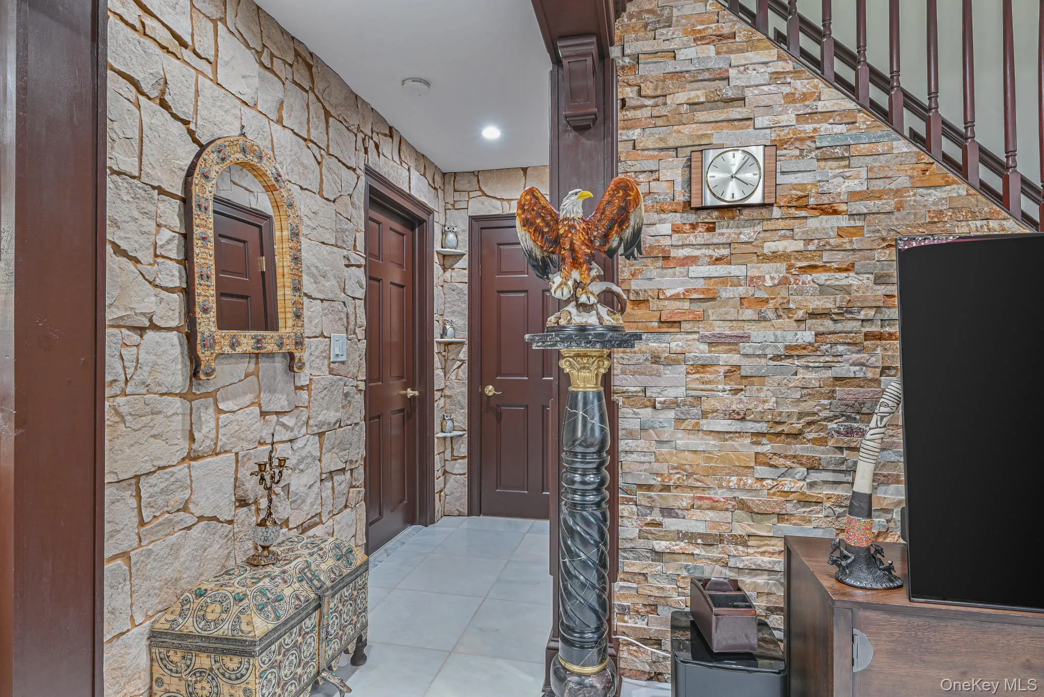 Corridor with light tile patterned floors and recessed lighting Corridor with light tile patterned floors and recessed lighting