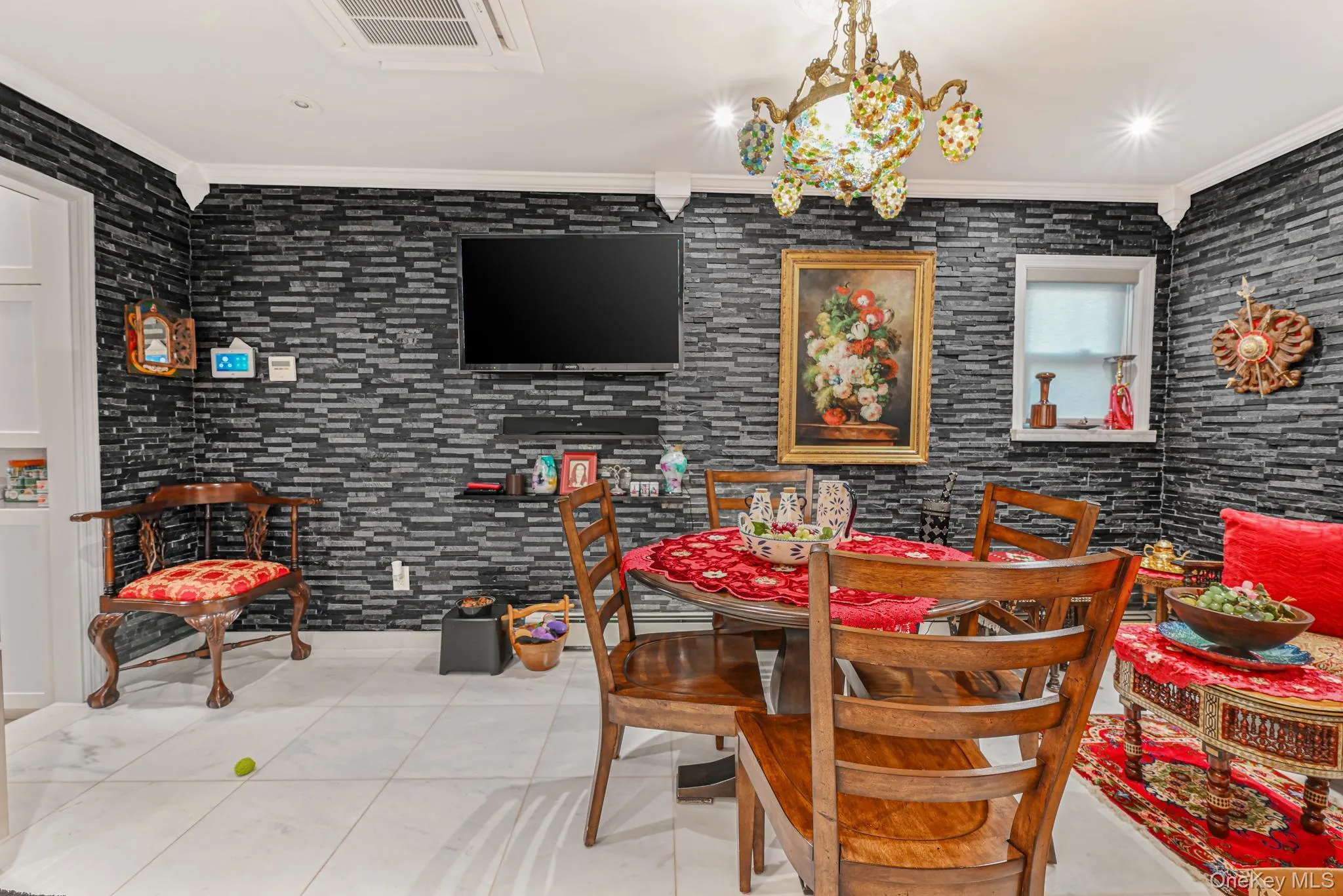 Dining area featuring ornamental molding, tile patterned flooring, and recessed lighting Dining area featuring ornamental molding, tile patterned flooring, and recessed lighting