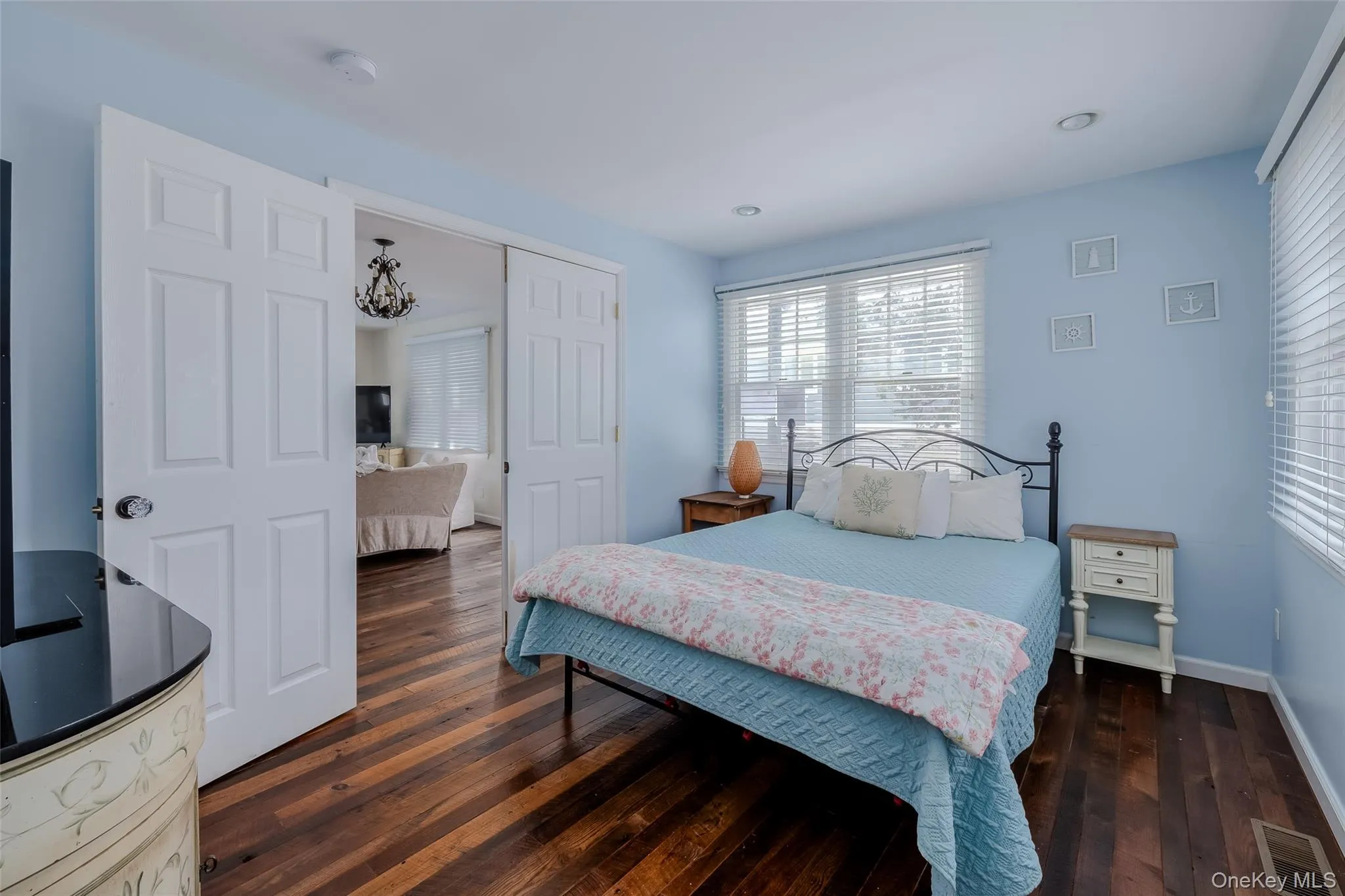 Bedroom featuring dark wood-type flooring Bedroom featuring dark wood-type flooring