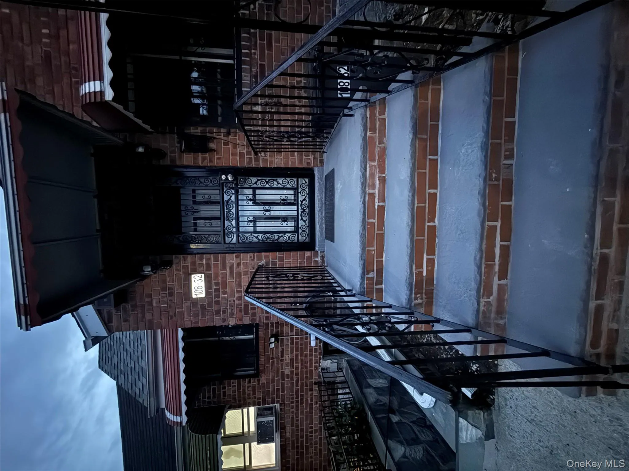 Property entrance featuring brick siding and cooling unit Property entrance featuring brick siding and cooling unit