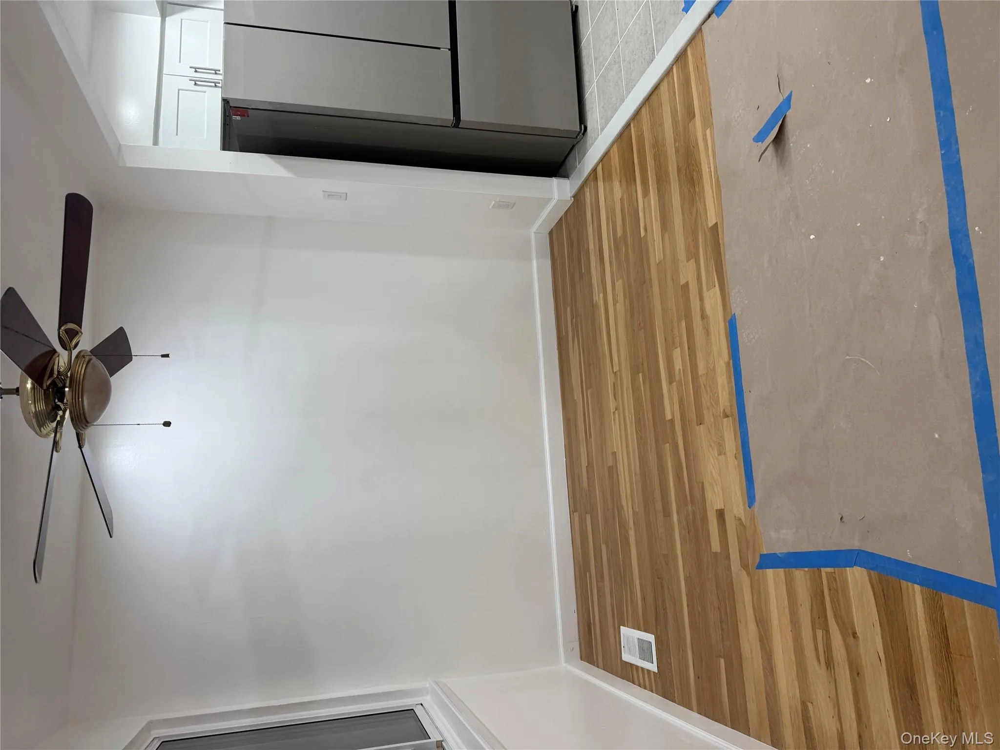 Unfurnished dining area with light wood finished floors and ceiling fan Unfurnished dining area with light wood finished floors and ceiling fan