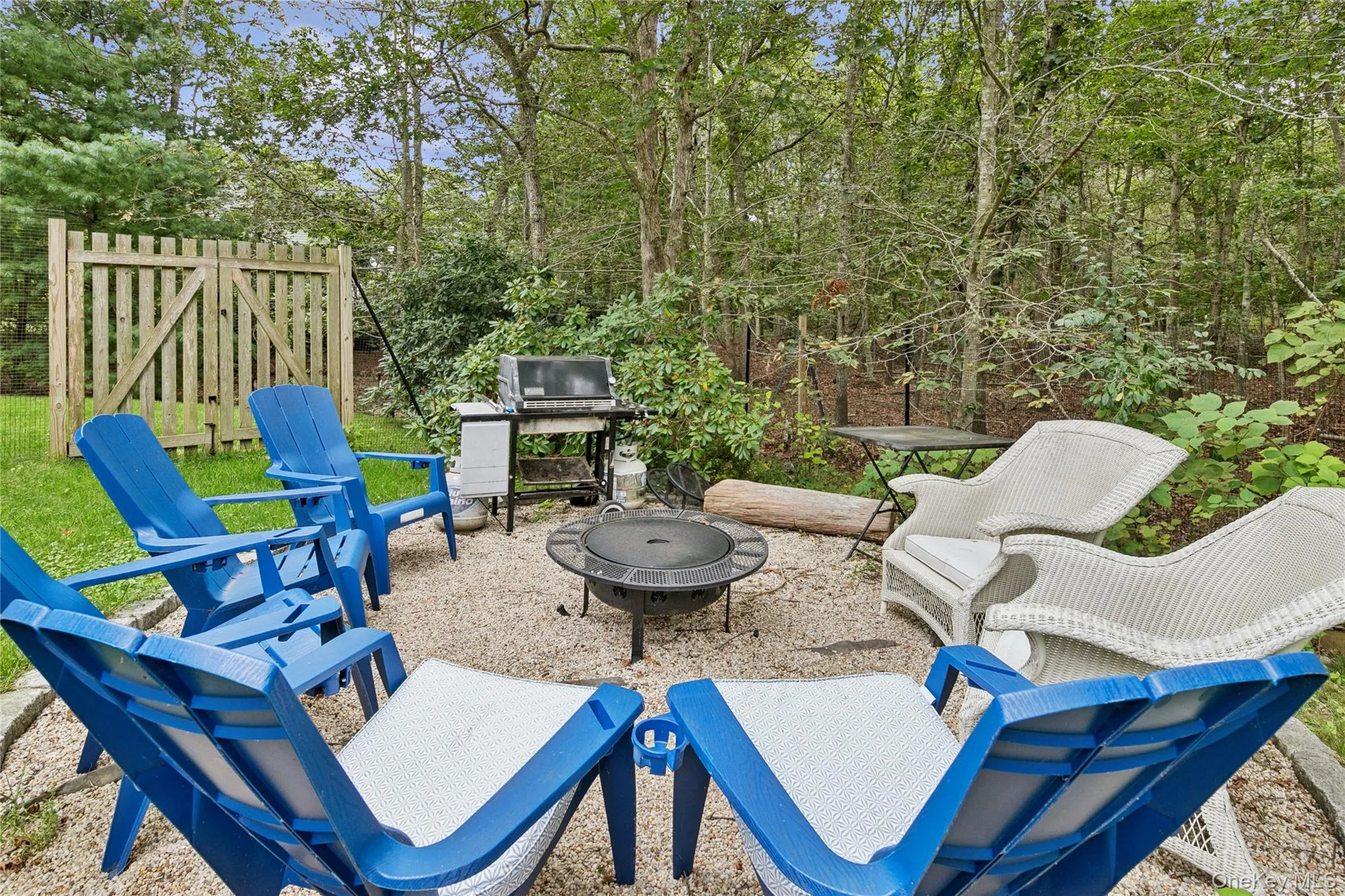 View of patio / terrace with a fire pit View of patio / terrace with a fire pit